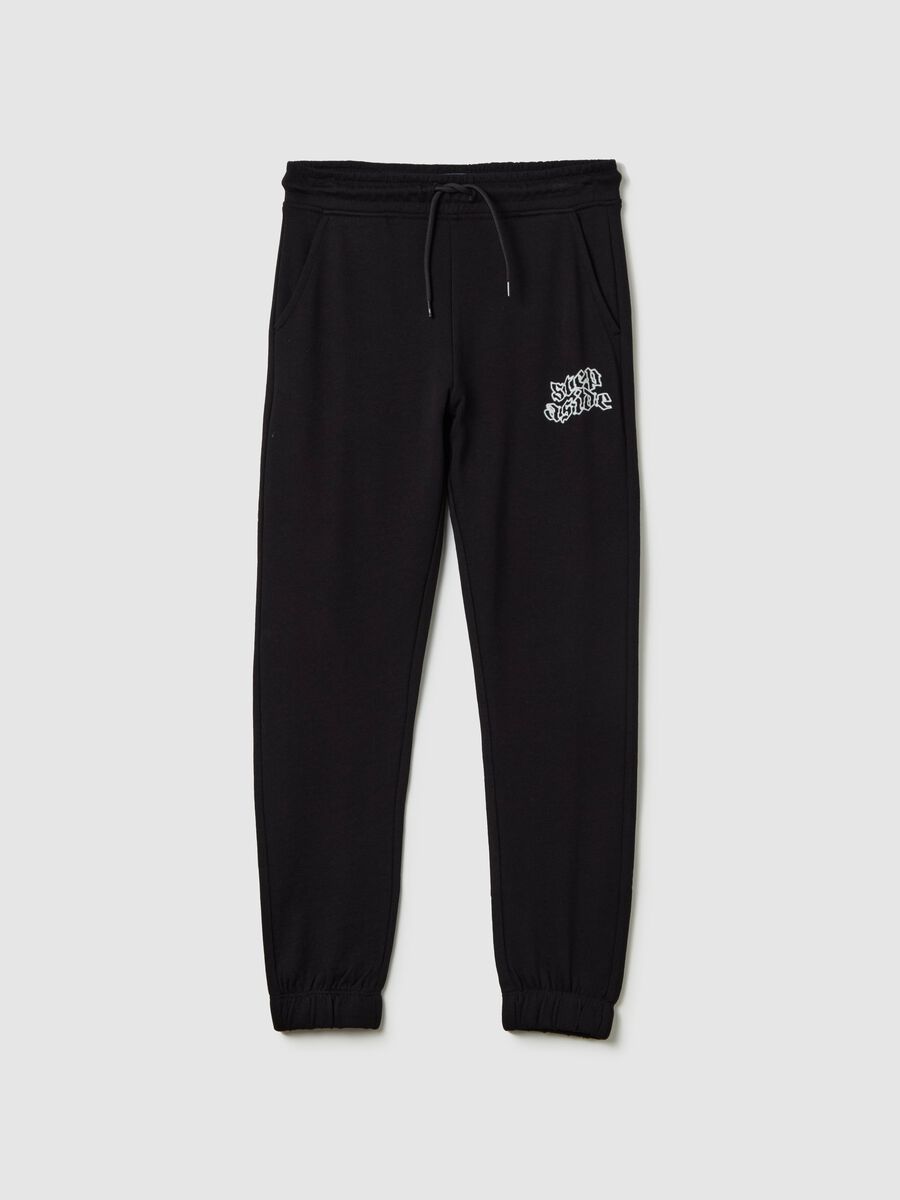 Joggers with drawstring and "Step Aside" print_0
