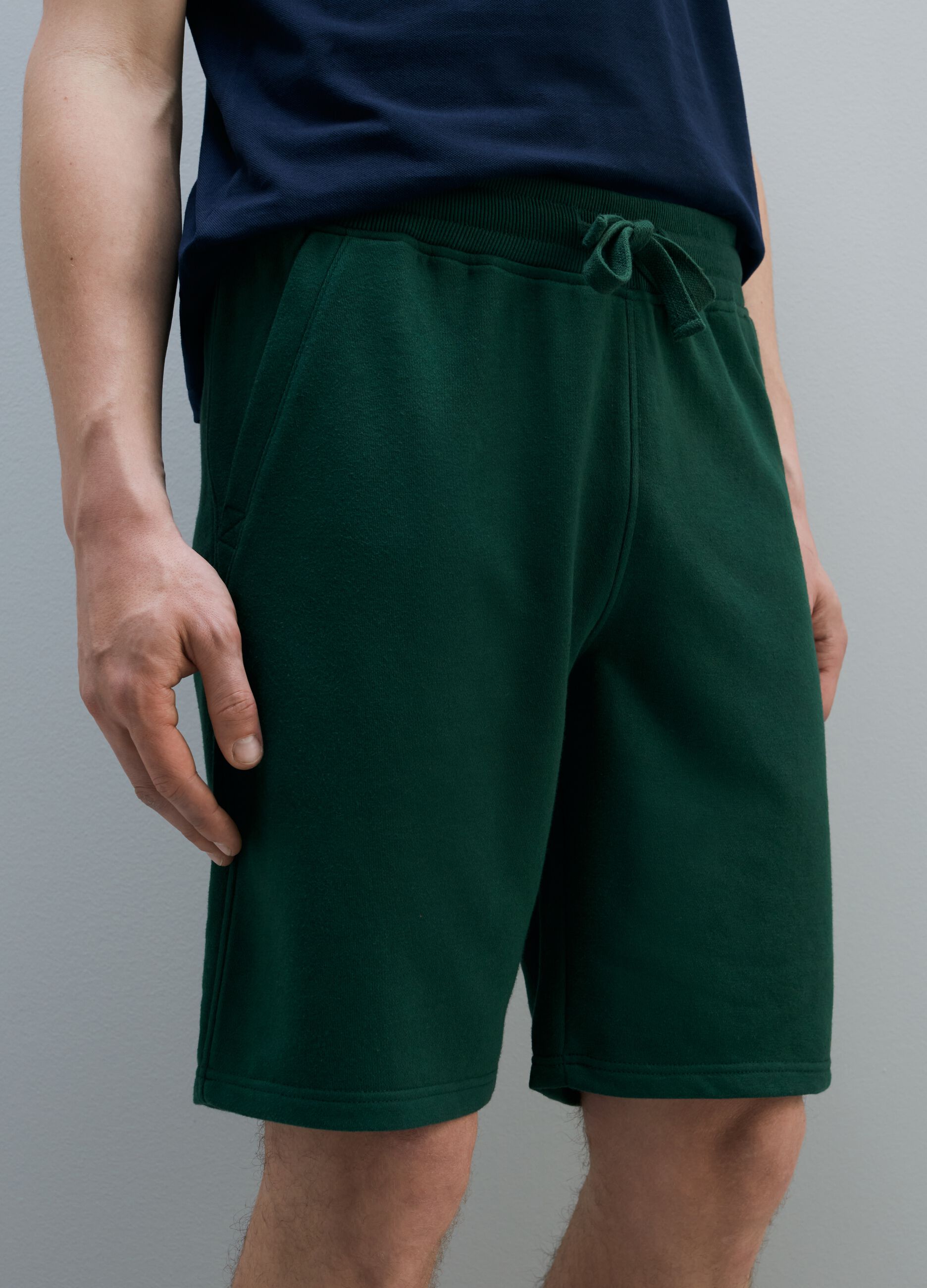 Fleece Bermuda shorts with print