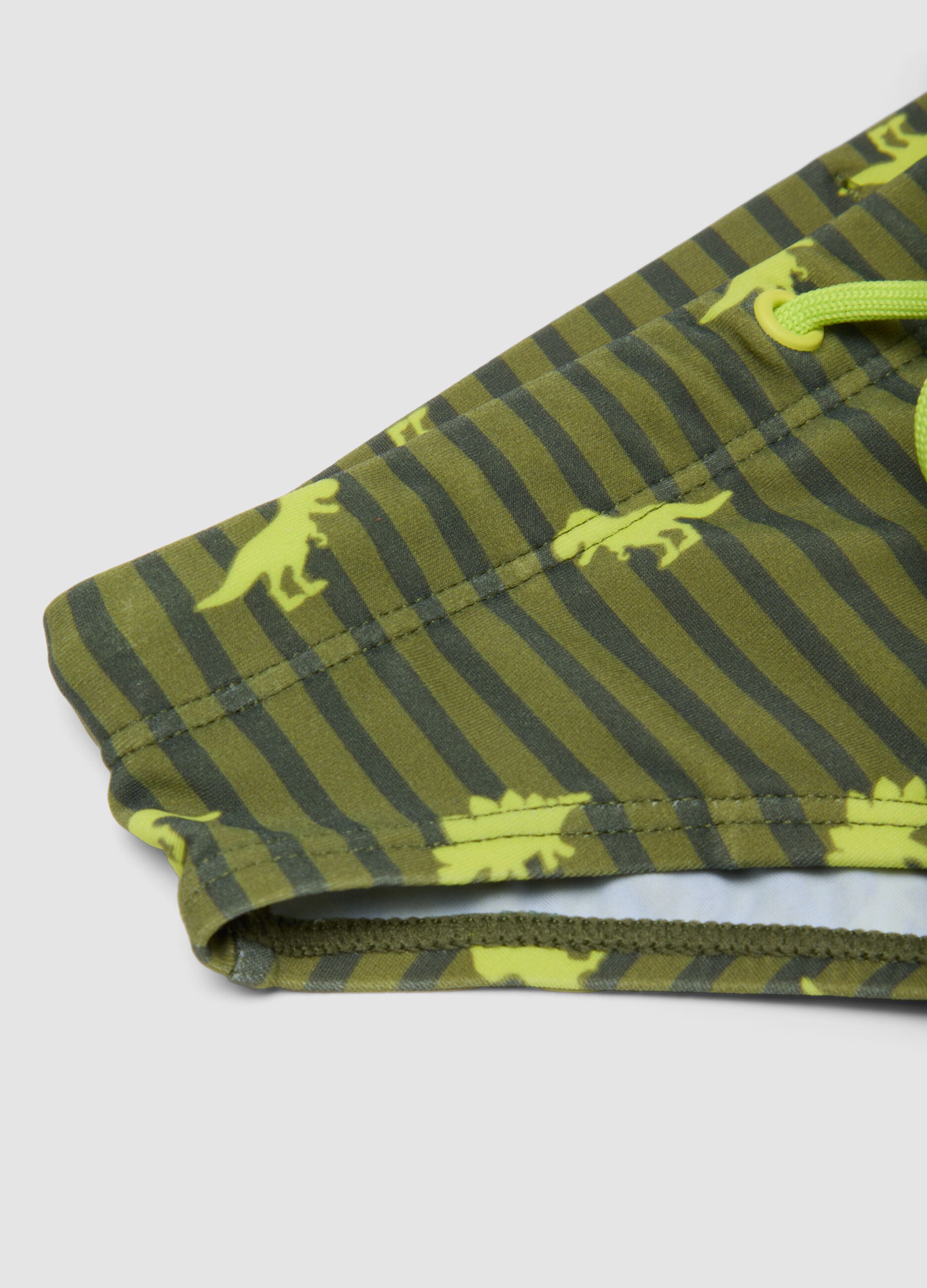 Green dinosaur-print stretch swim briefs