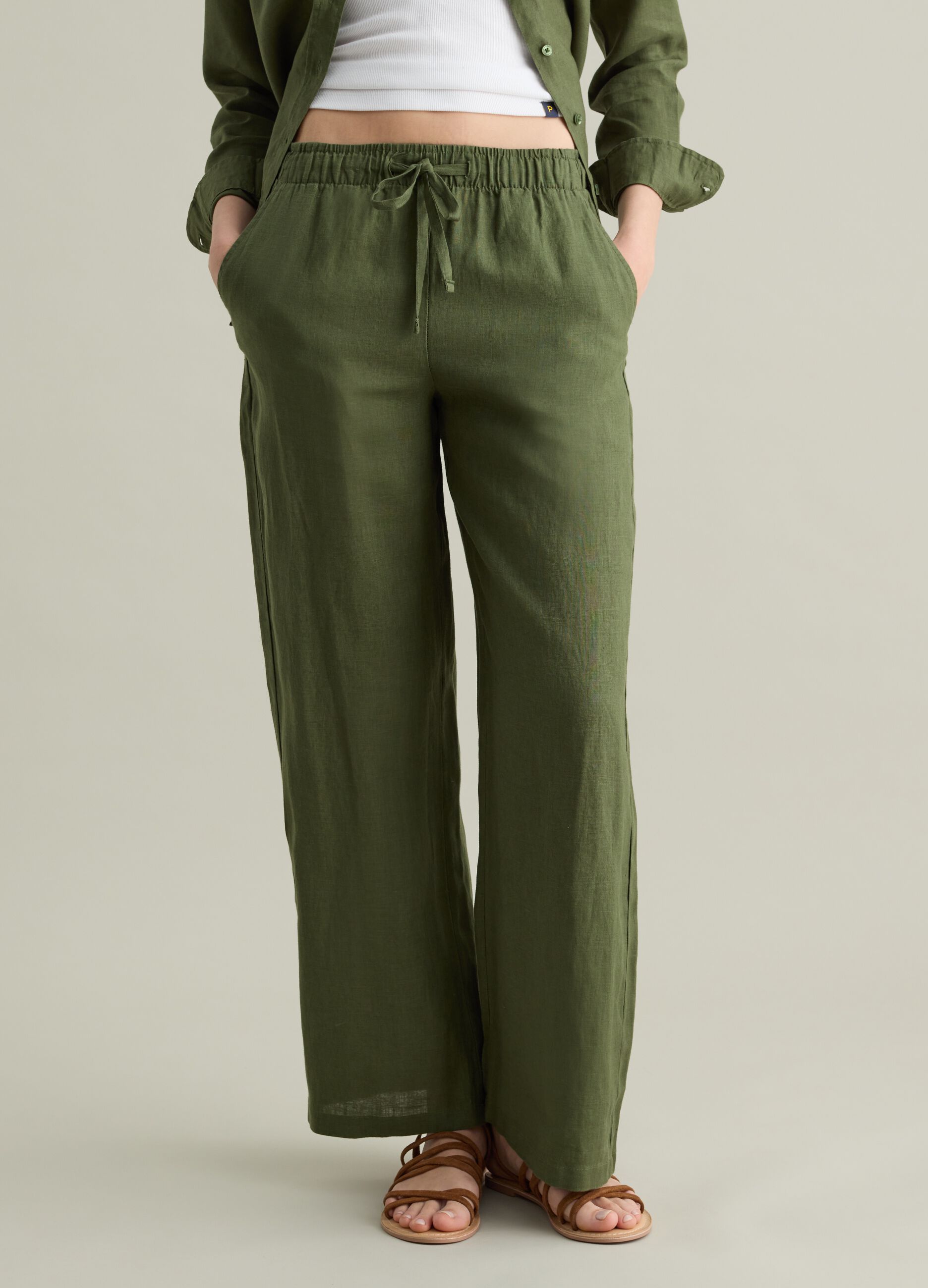 Green wide-leg fluid trousers in linen