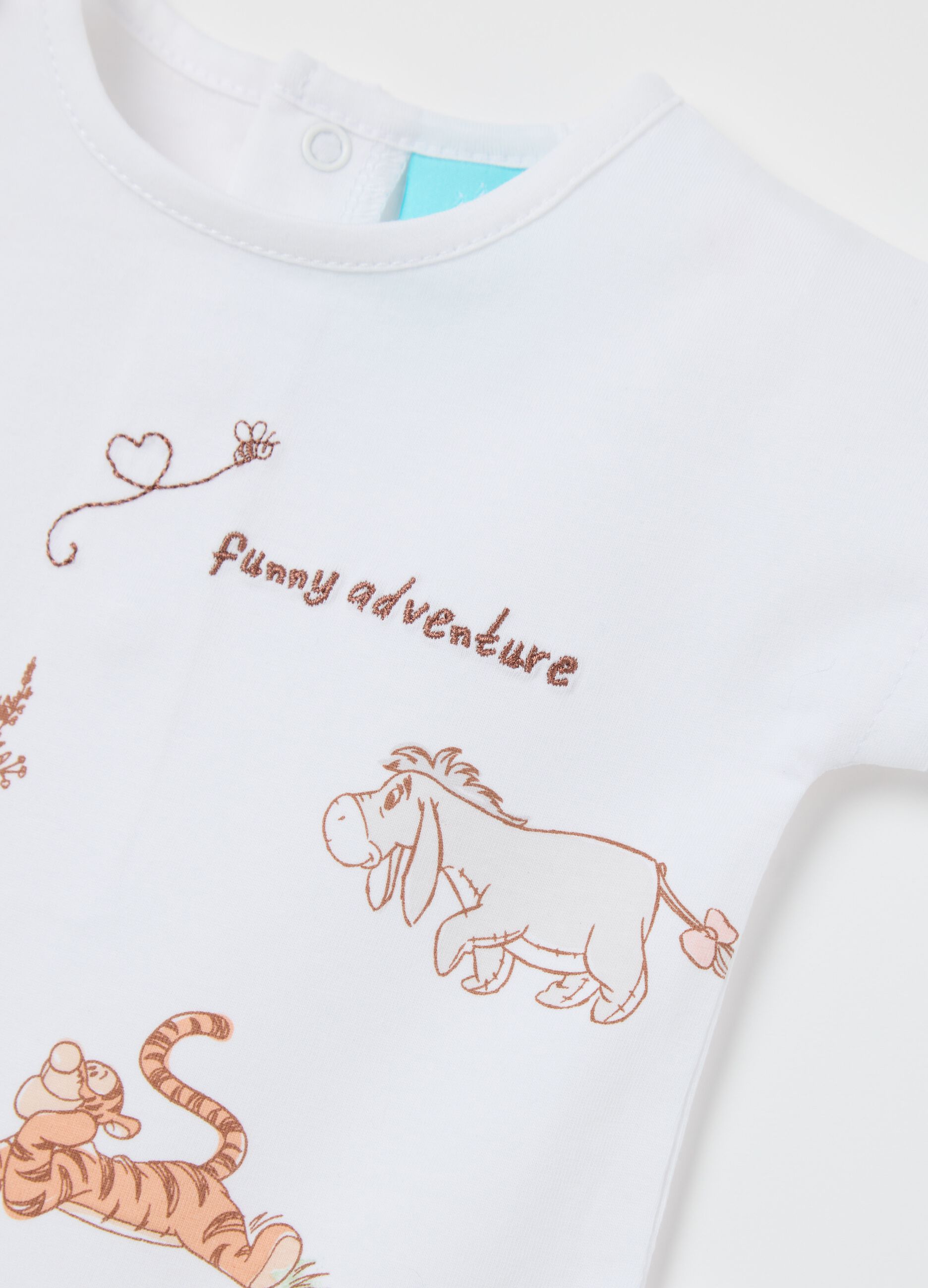 White bodysuit in organic cotton with Winnie the Pooh print
