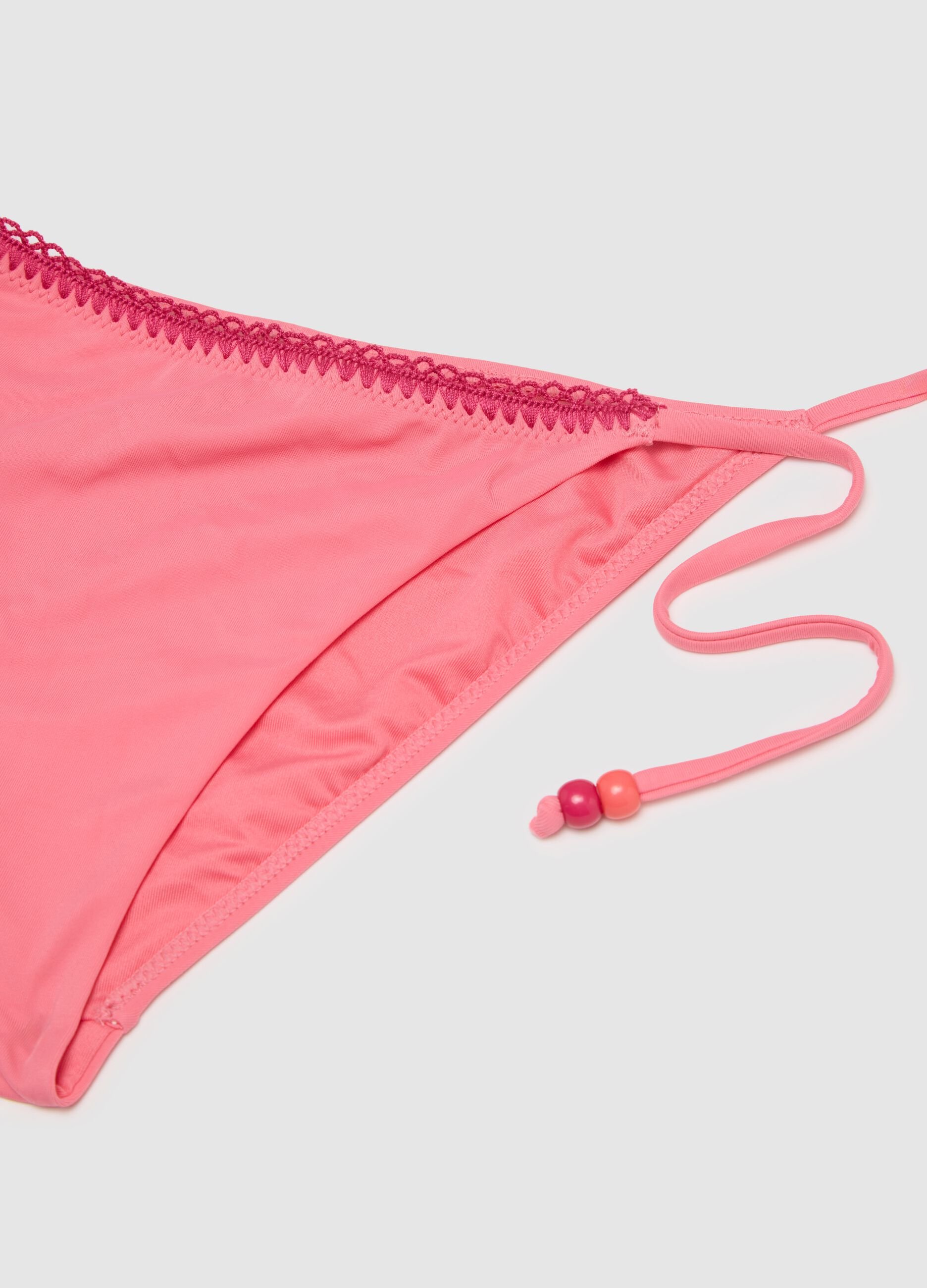 Women's pink mixed bikini with floral details