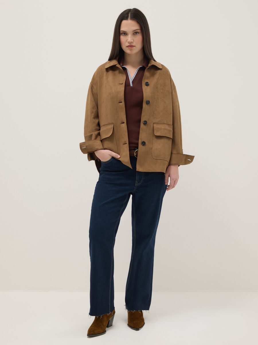 Jeans blu elasticizzati con taglio flare_0