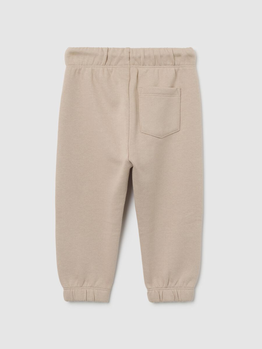 Children's beige pure cotton regular fit trousers with print_1