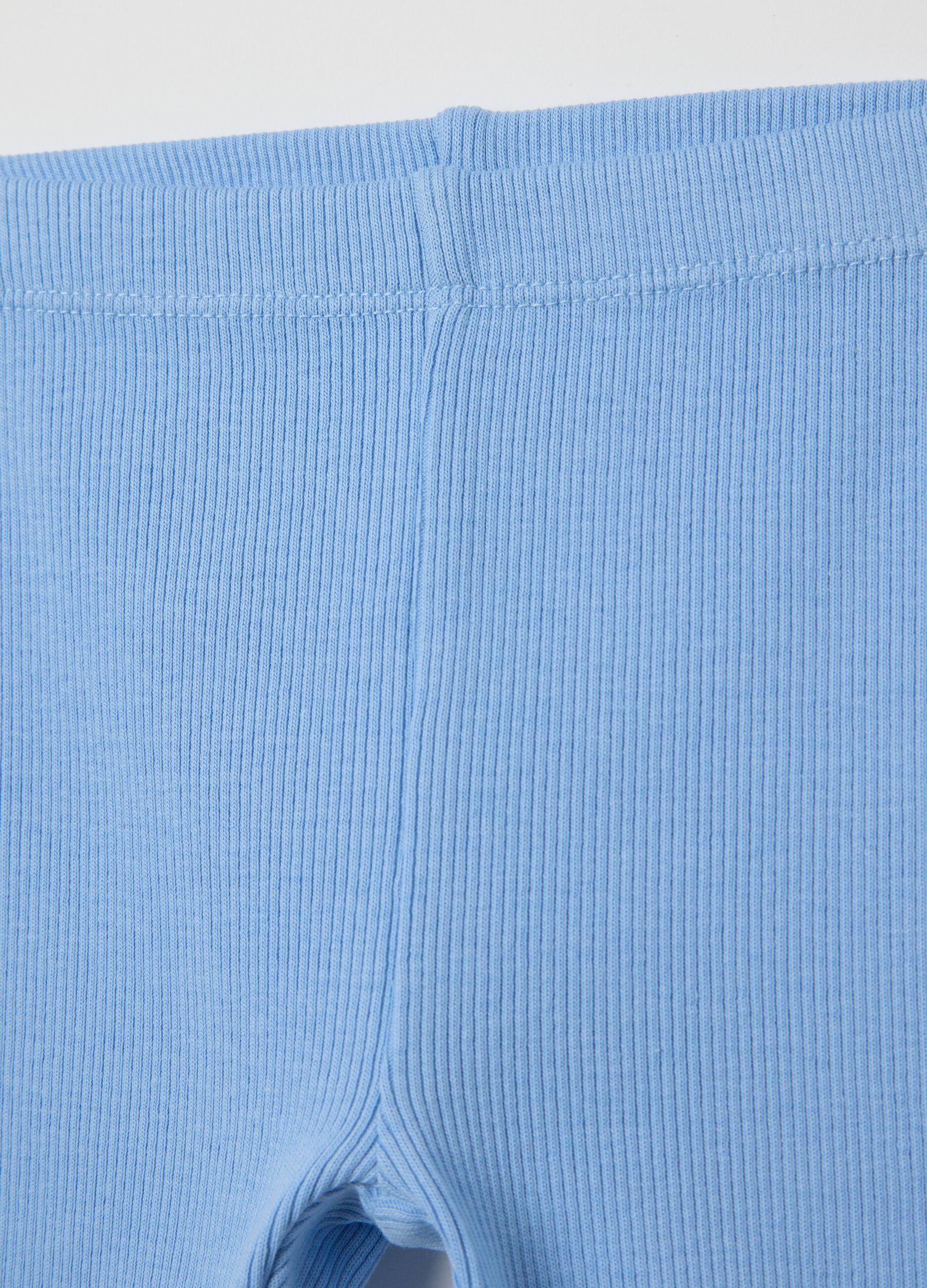 Ribbed light blue shorts with wavy hem