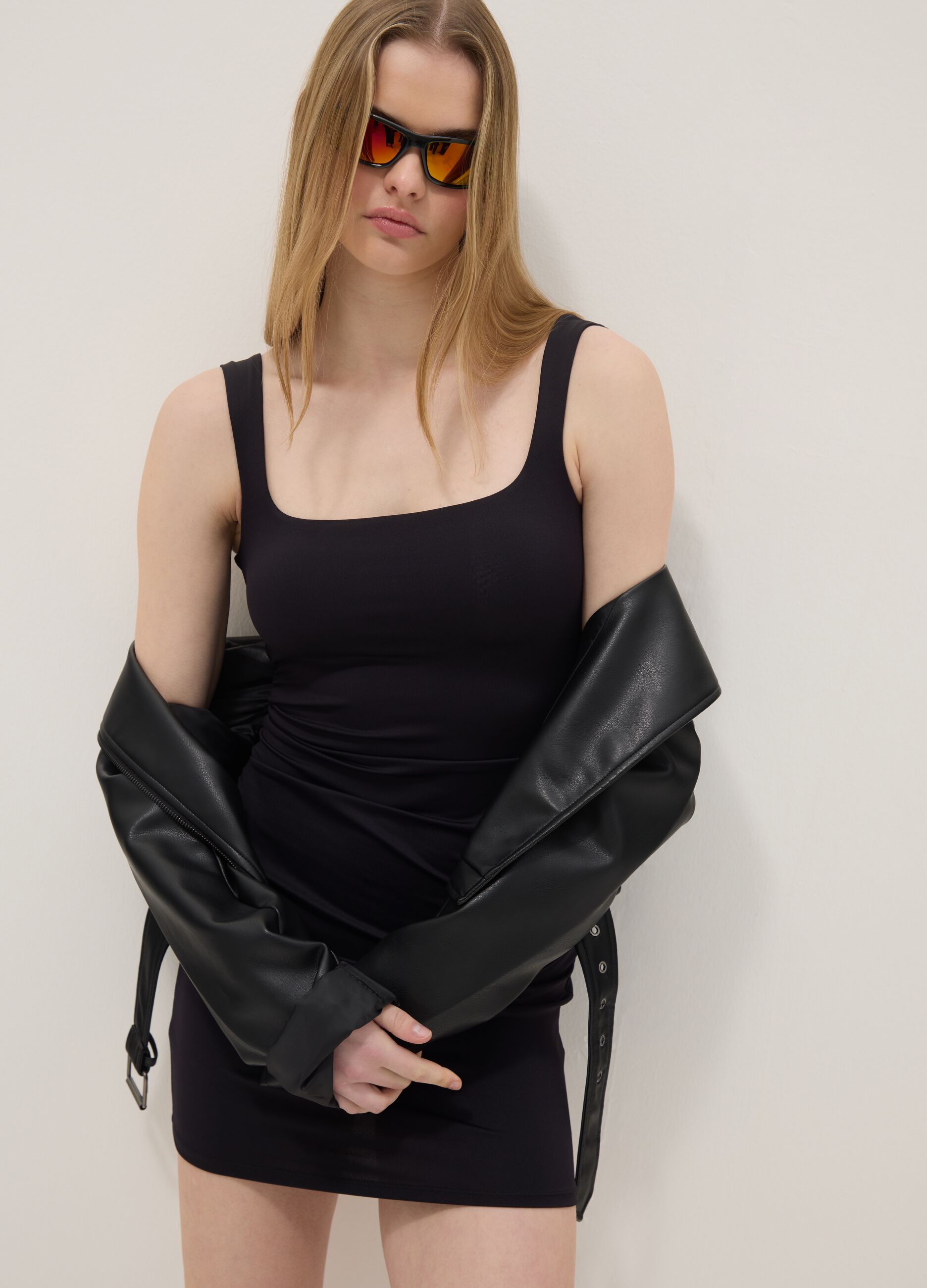 Black fitted dress with square neckline