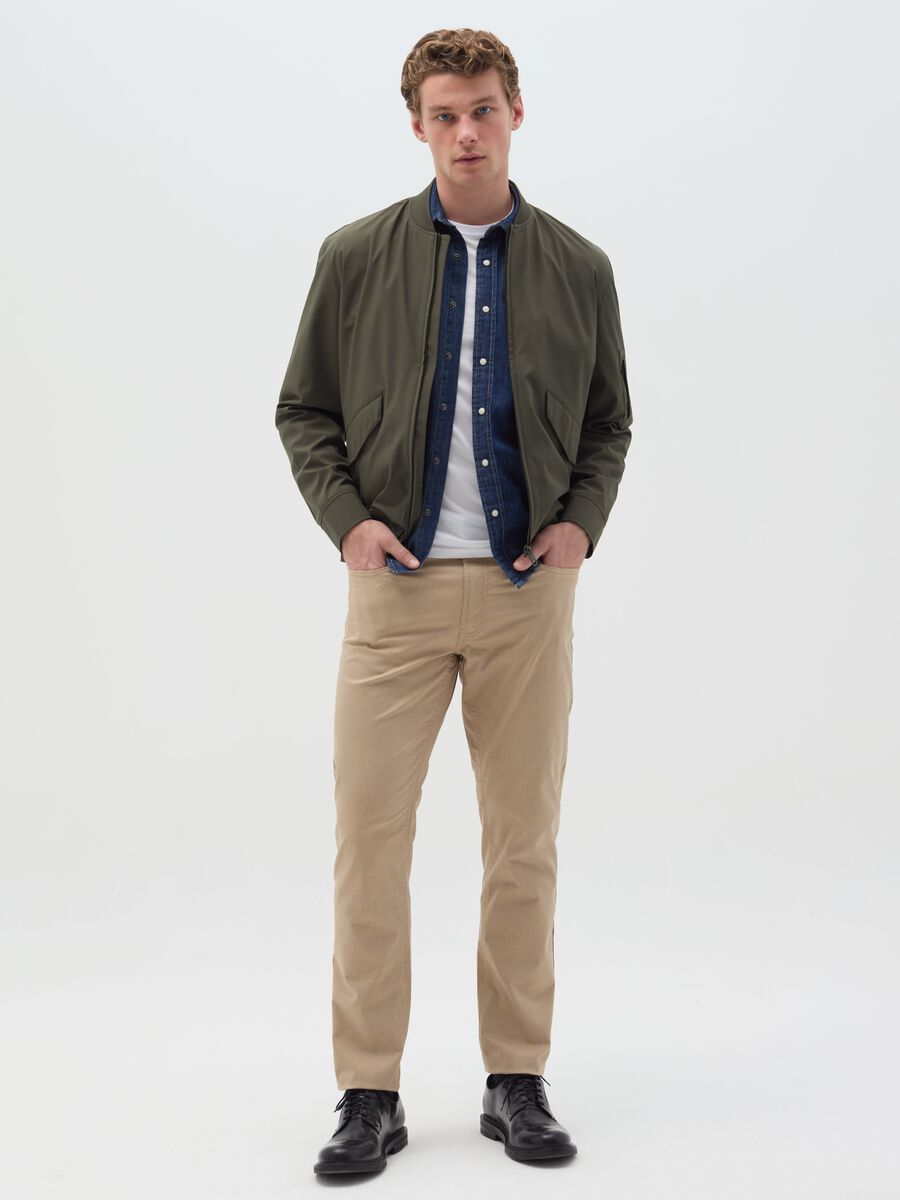 Stretch slim-fit trousers with five pockets_0
