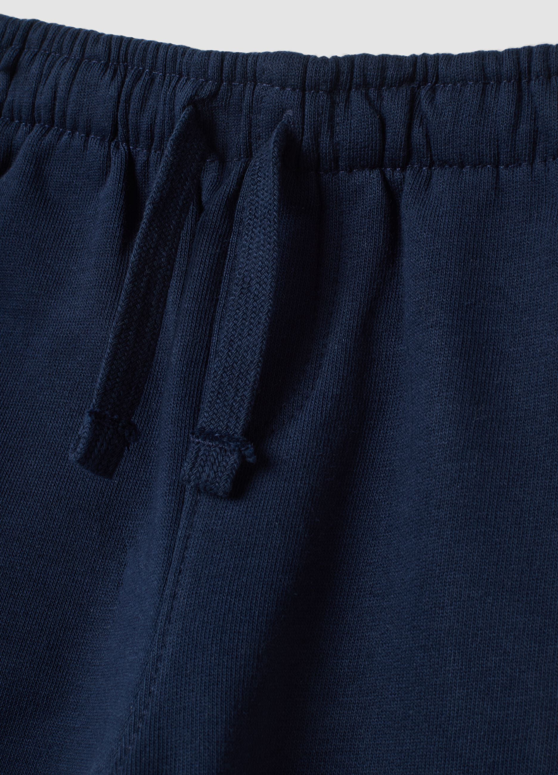 Blue pure cotton over-fit trousers with dinosaur print