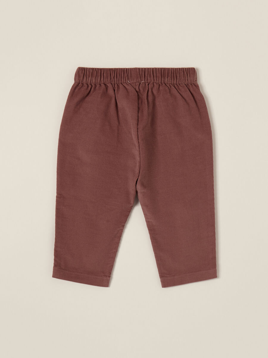 Pantaloni rosa in velluto a coste per bambina_1