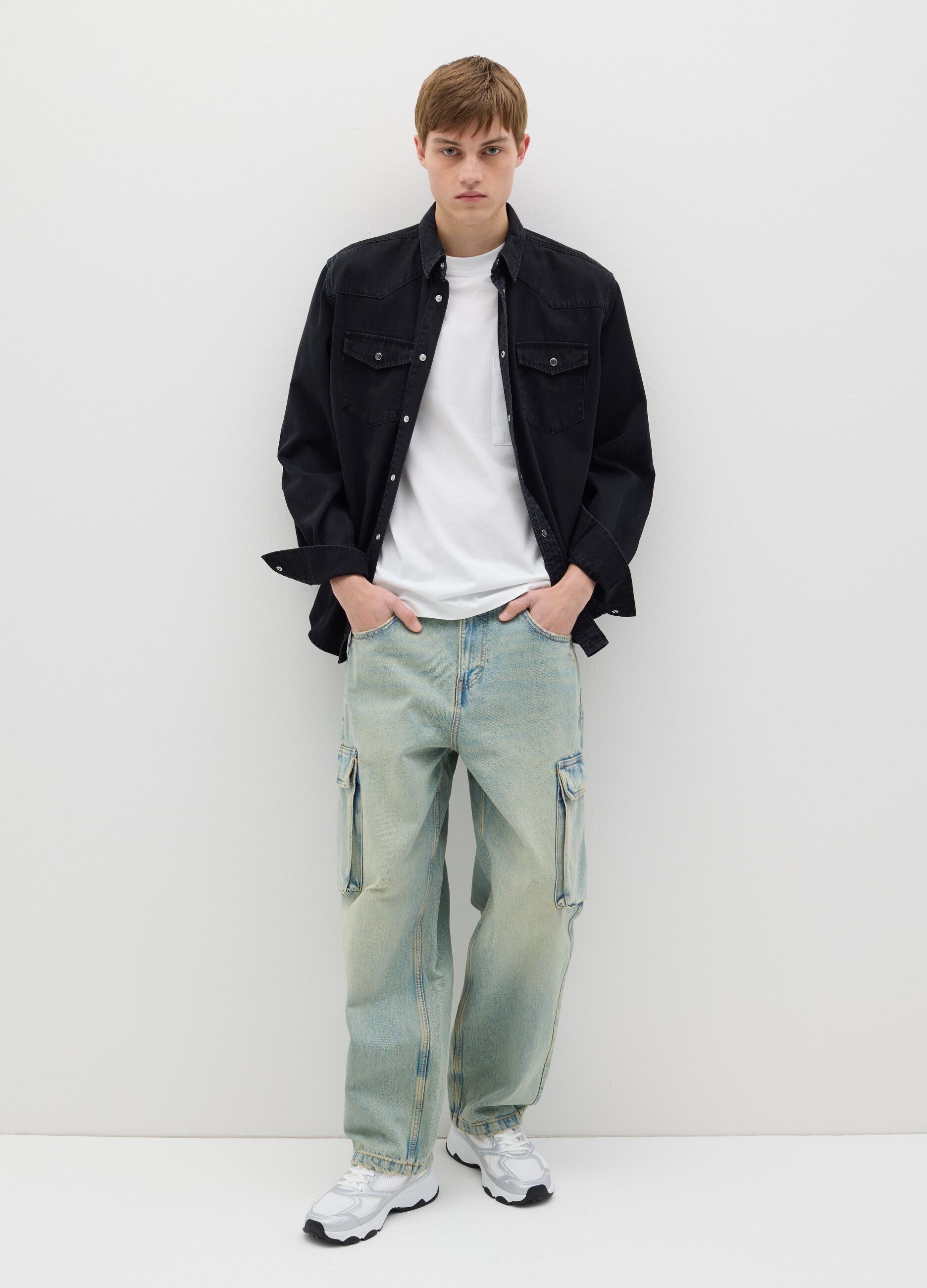 Jeans cargo acid wash con scoloriture