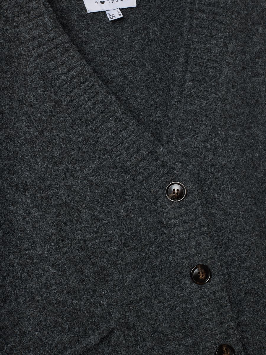 Cardigan grigio in lana elasticizzata con scollo profondo a V_1