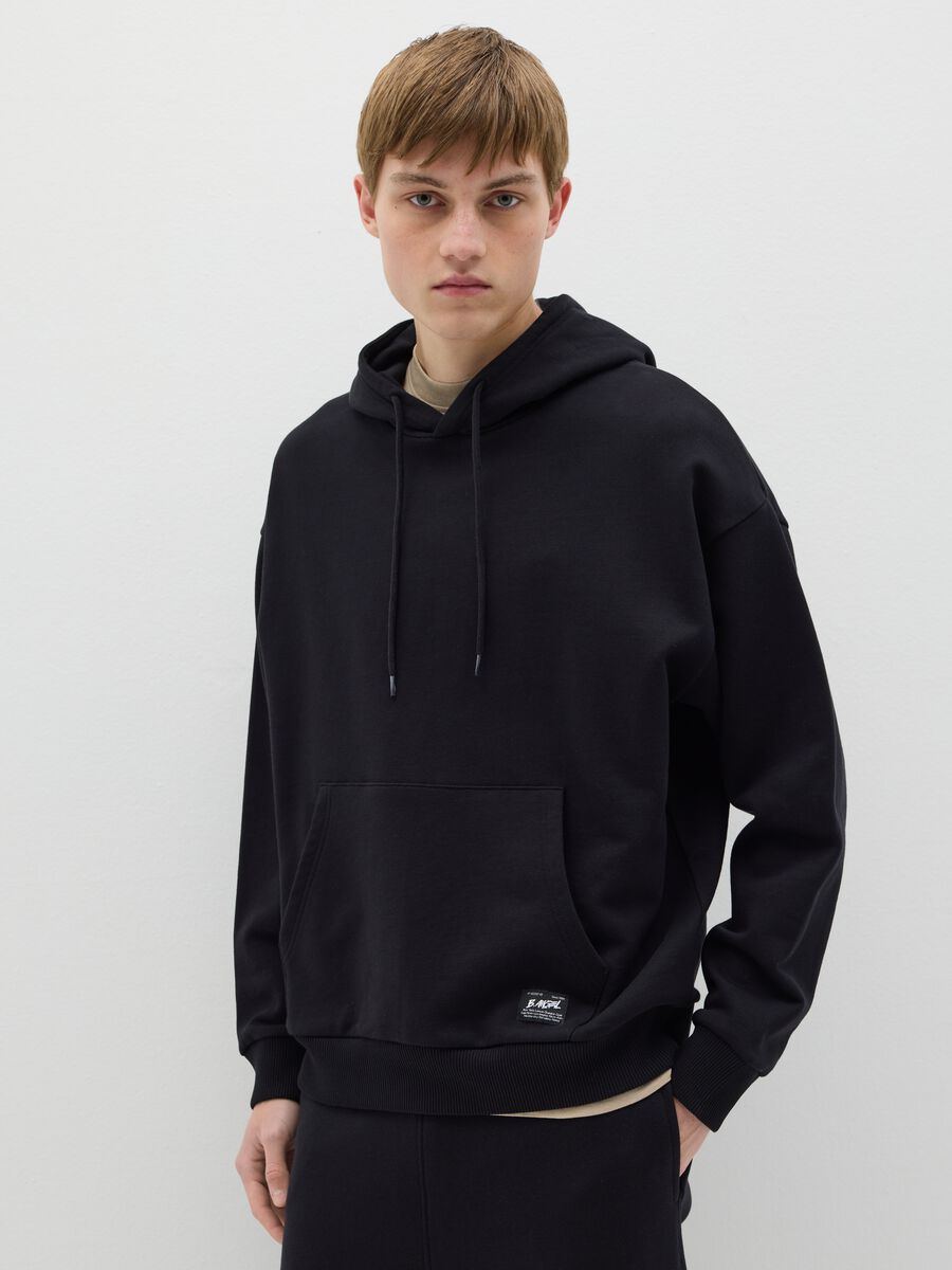 Over-fit sweatshirt in cotton with hood_0