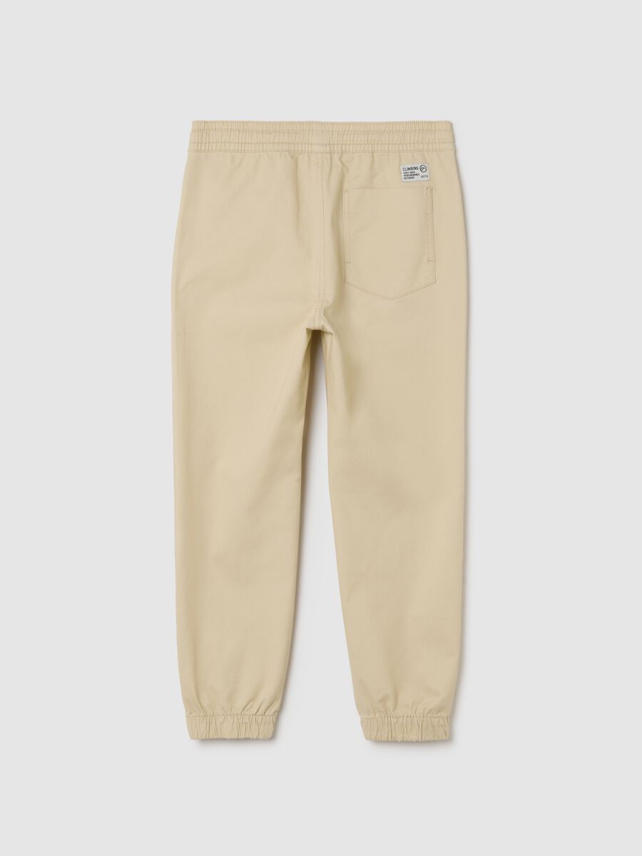 Pantaloni da ragazzo in cotone elasticizzato beige relaxed fit_1