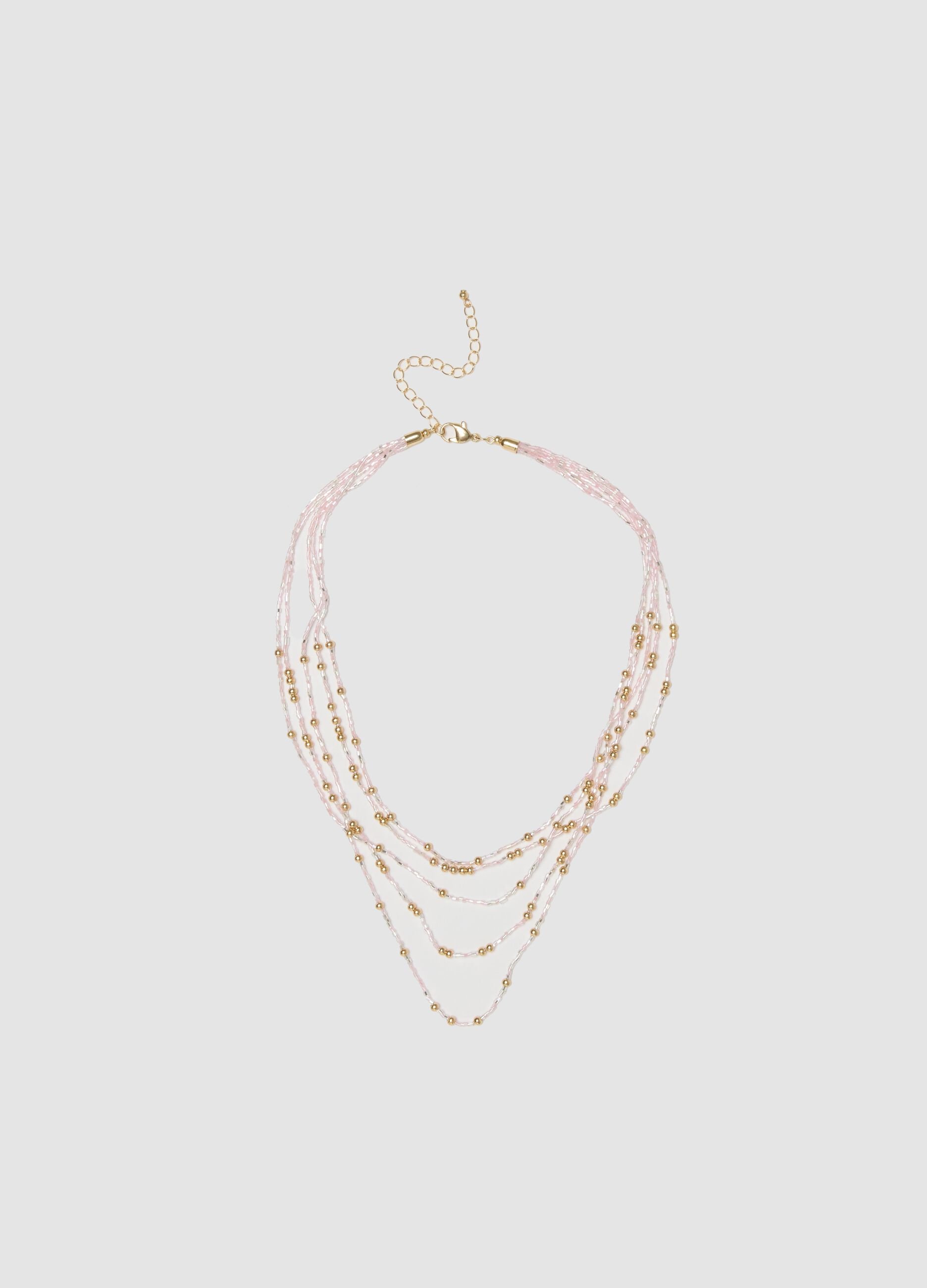 Multi-strand necklace with gold and pink beads