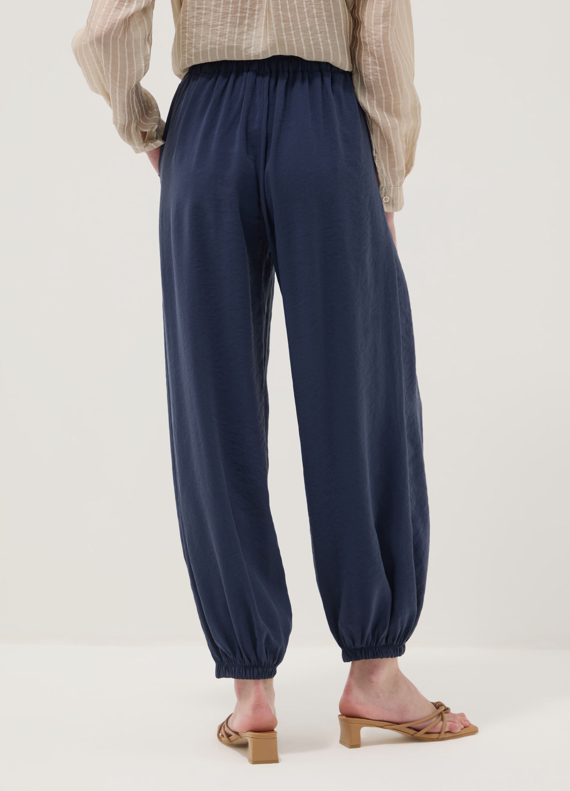 Blue viscose-blend trousers with elasticated cuffs, regular fit