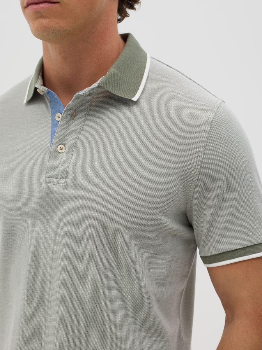 Green polo shirt with short sleeves in cotton piquet_3