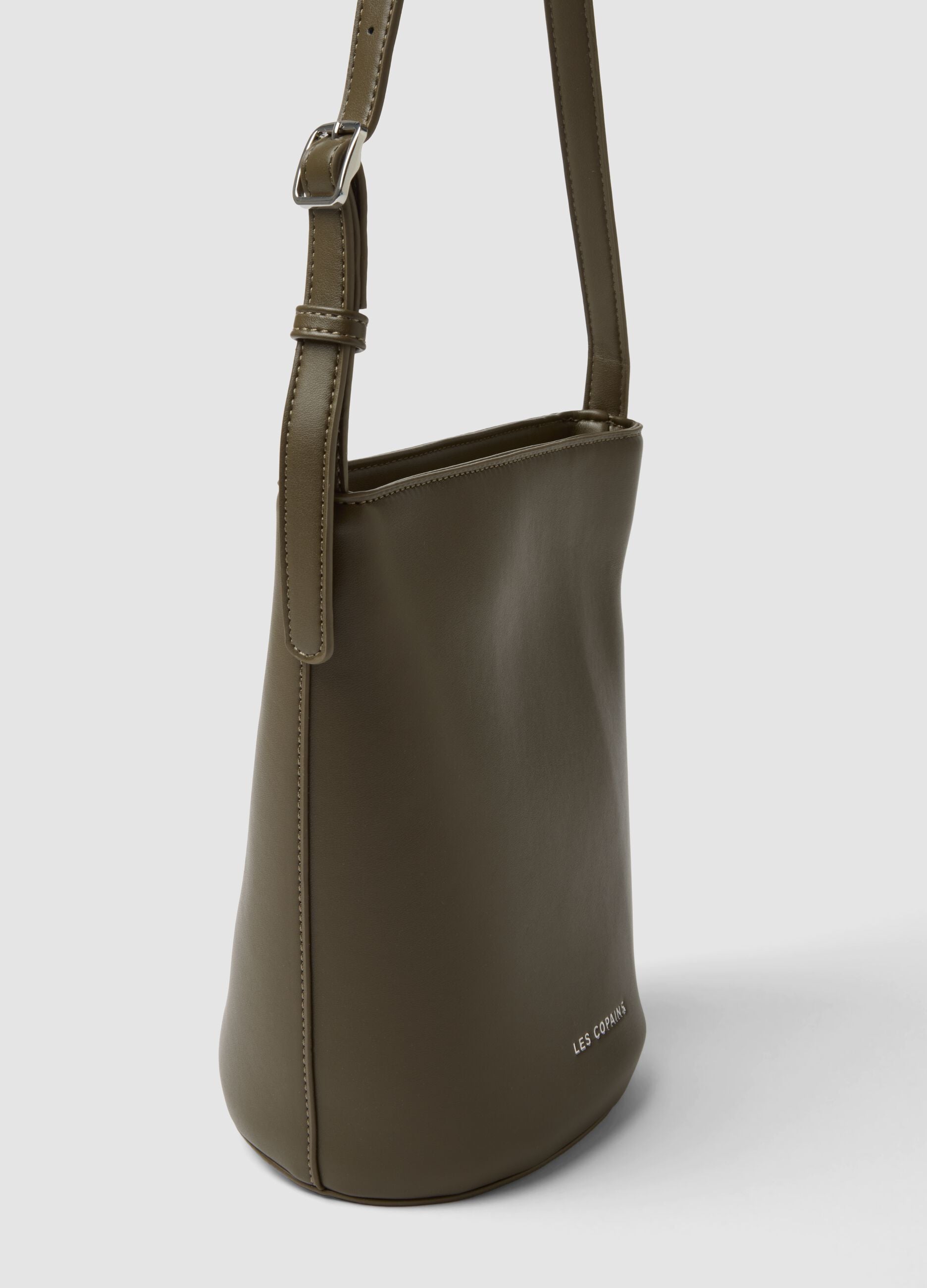 Green bucket bag with adjustable shoulder strap