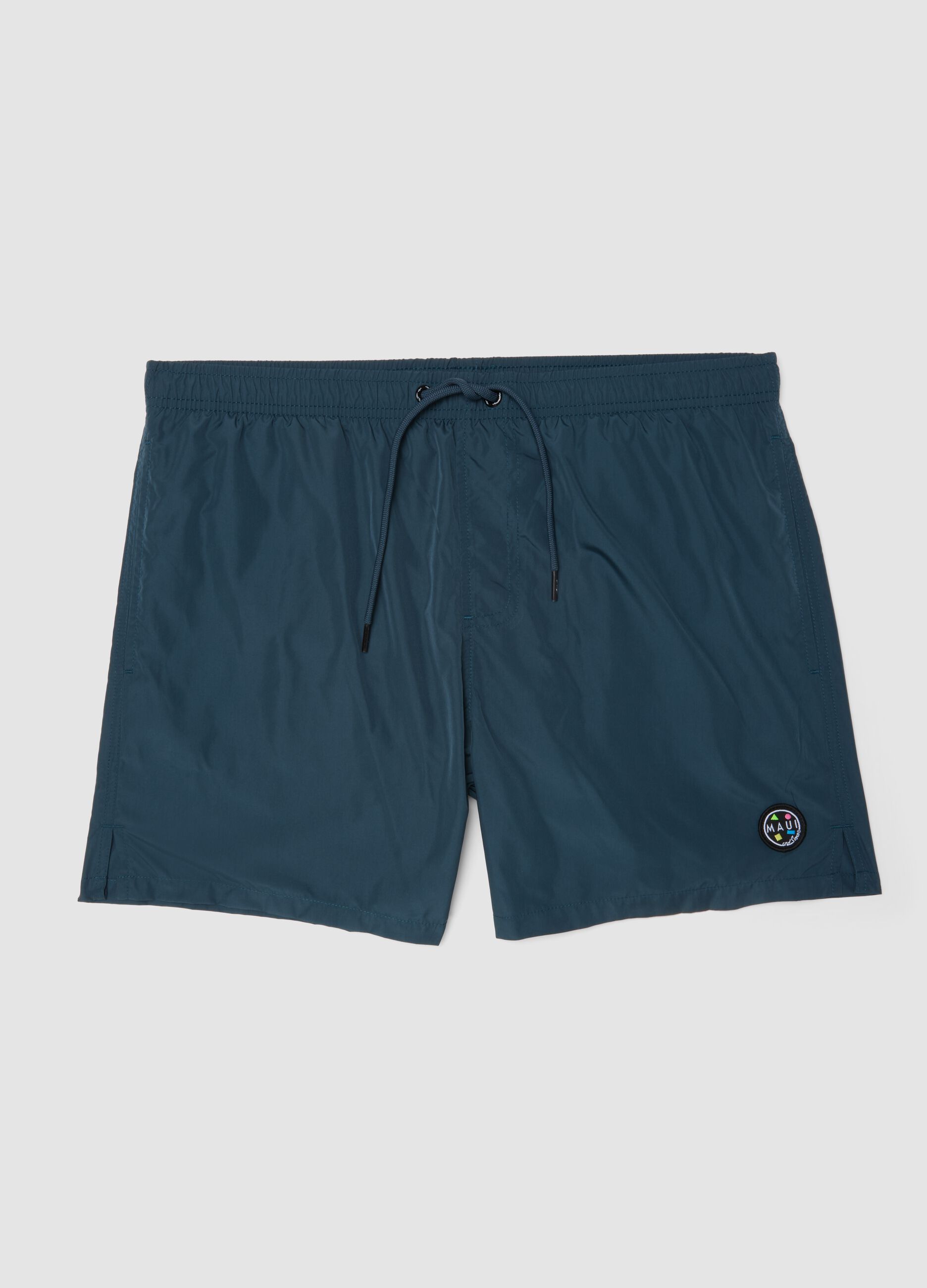 Blue swim shorts with elasticated waistband and drawstring