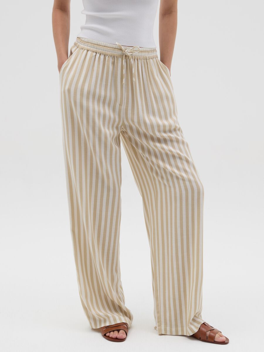 Striped beige palazzo trousers in viscose and linen_1