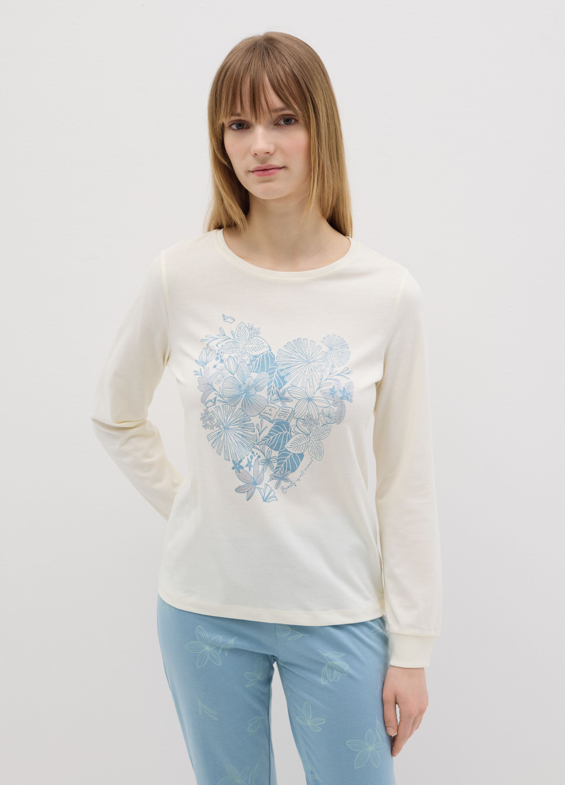 White and light blue cotton pyjamas with floral print