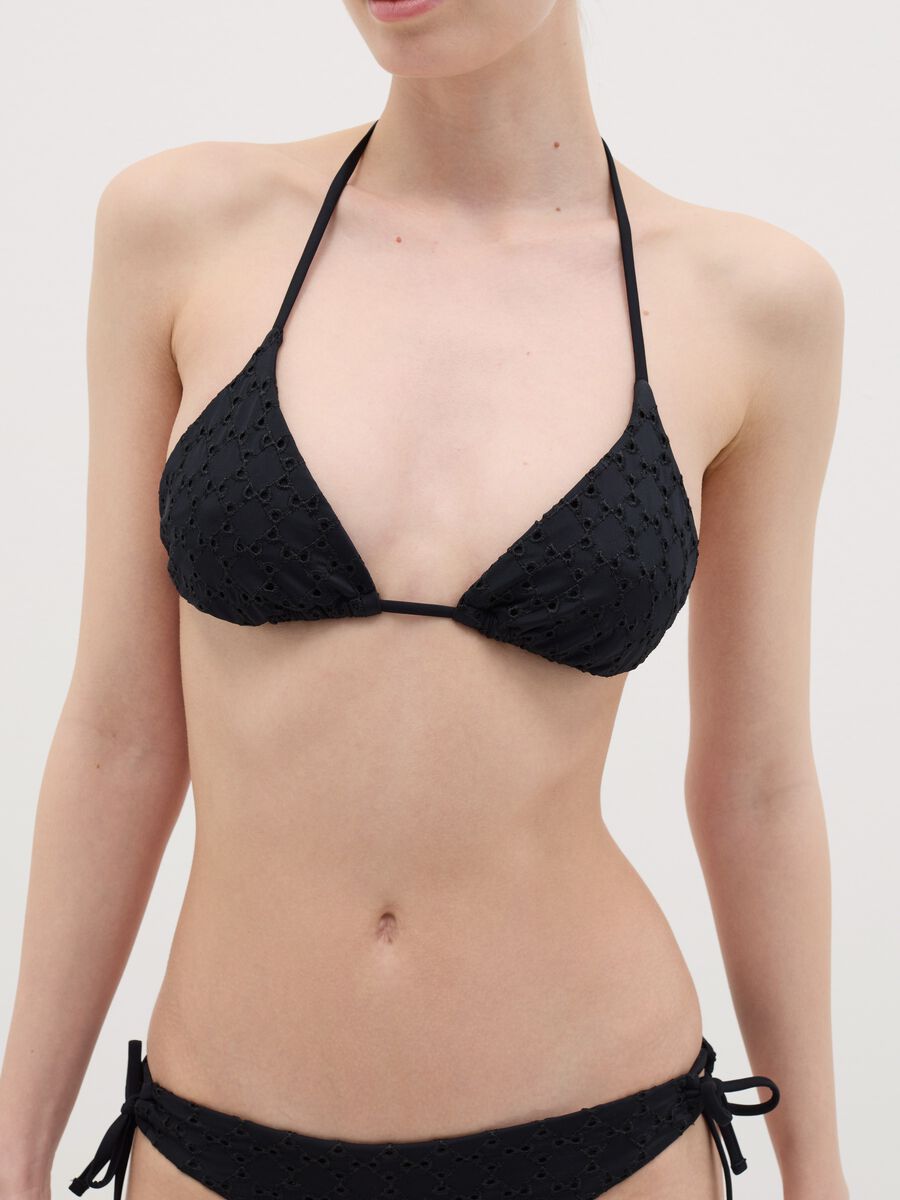 Women’s bikini top in black stretch fabric with perforated design._1