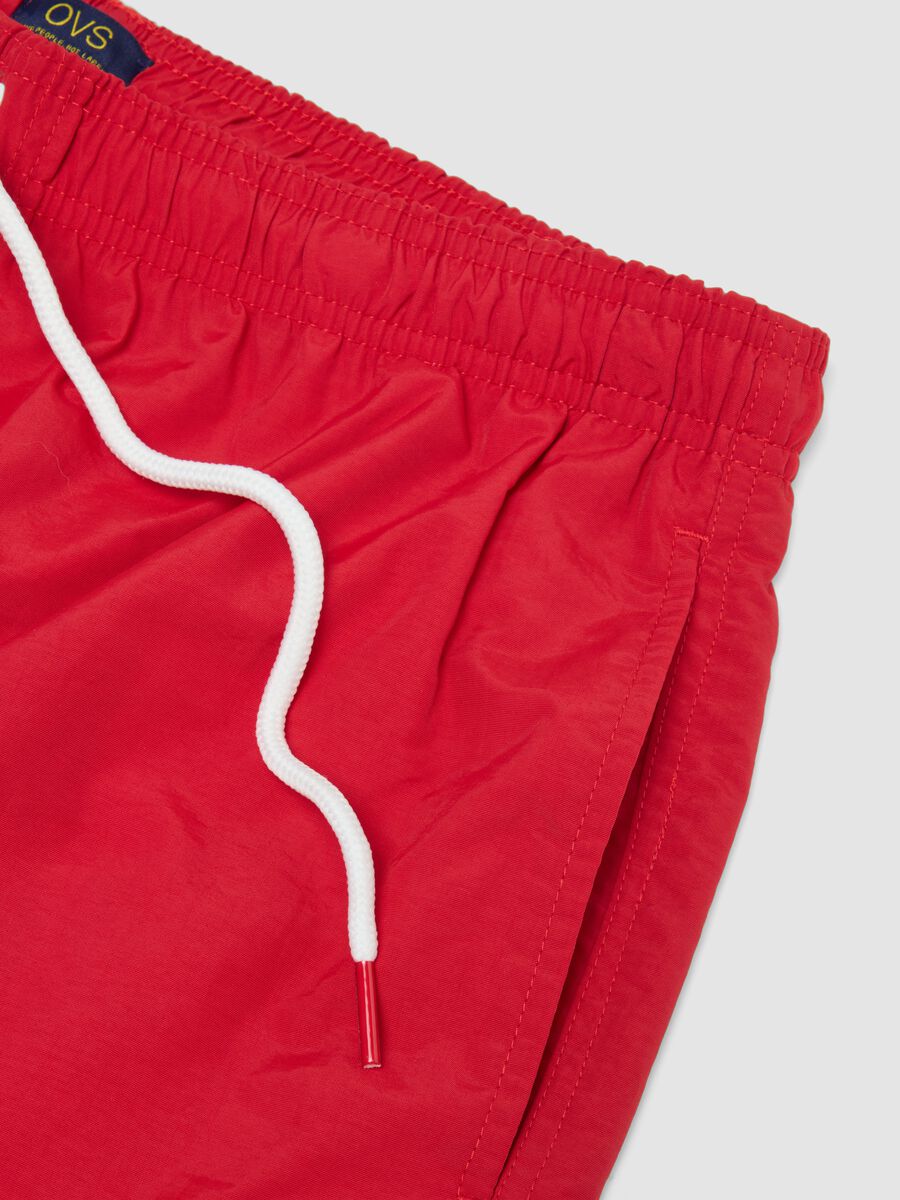 Red swim shorts with elasticated waist_5