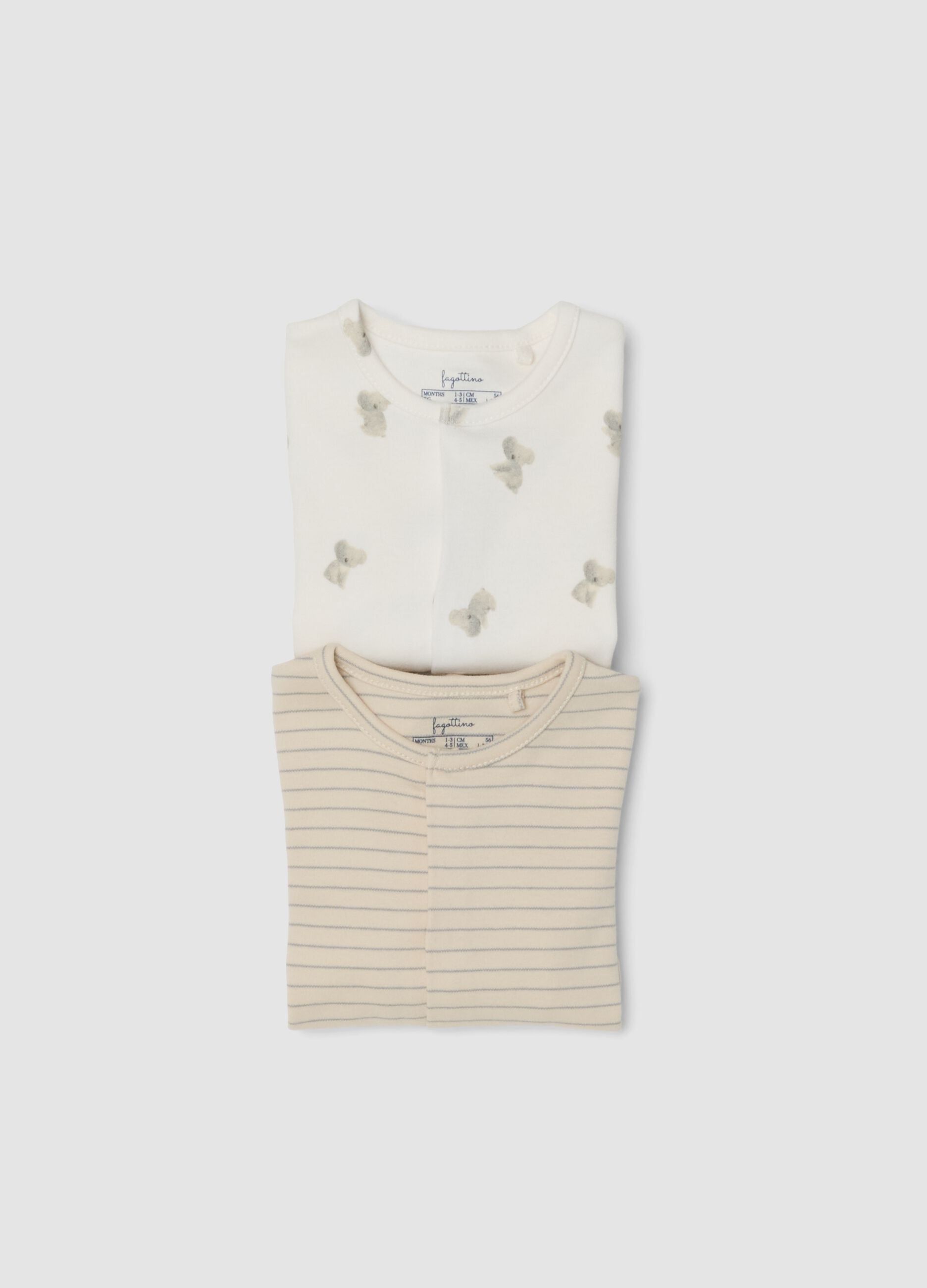 2-pack of organic cotton baby sleepsuits with feet in beige and white