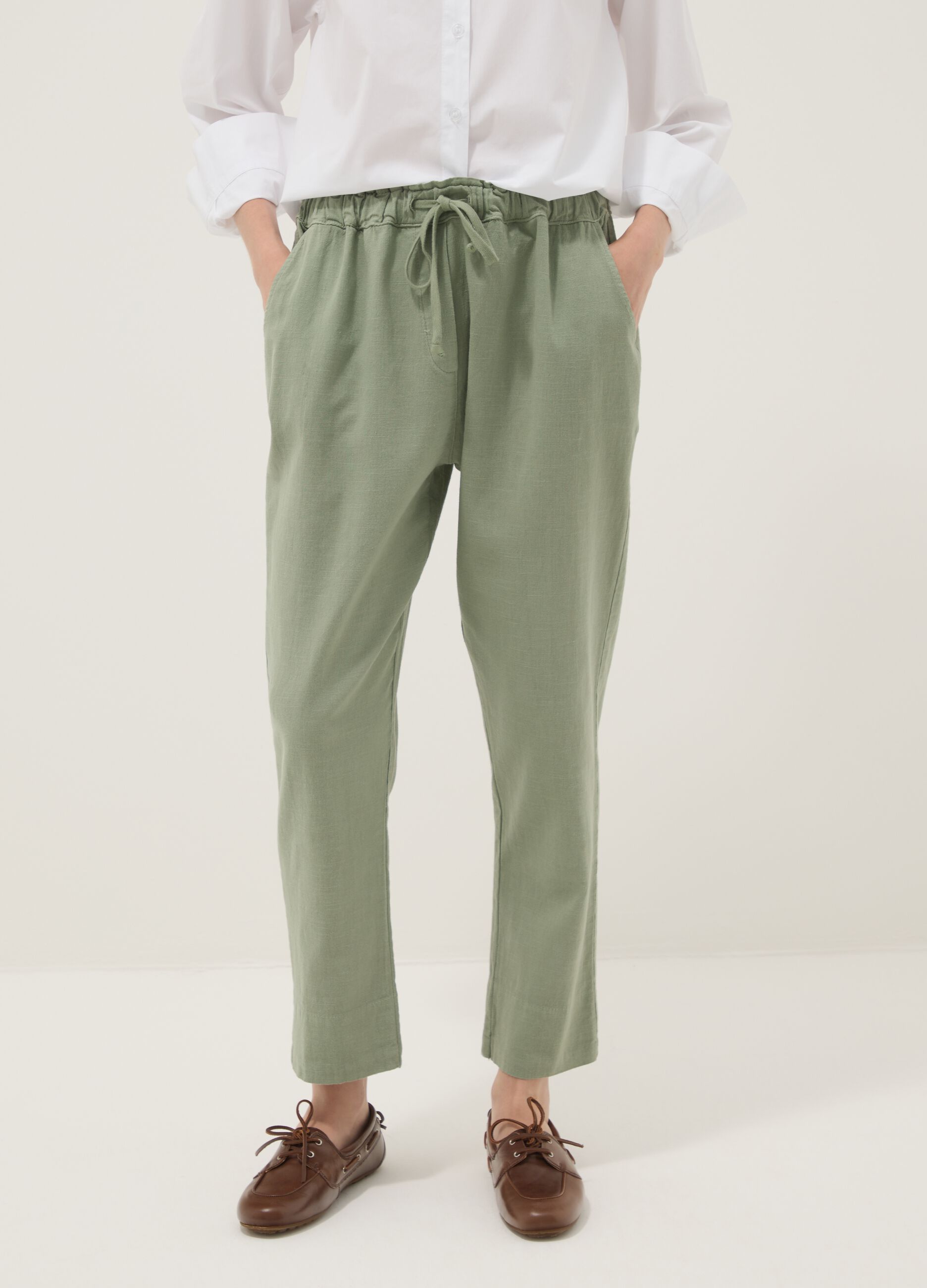 Green linen-cotton blend trousers with elasticated waist