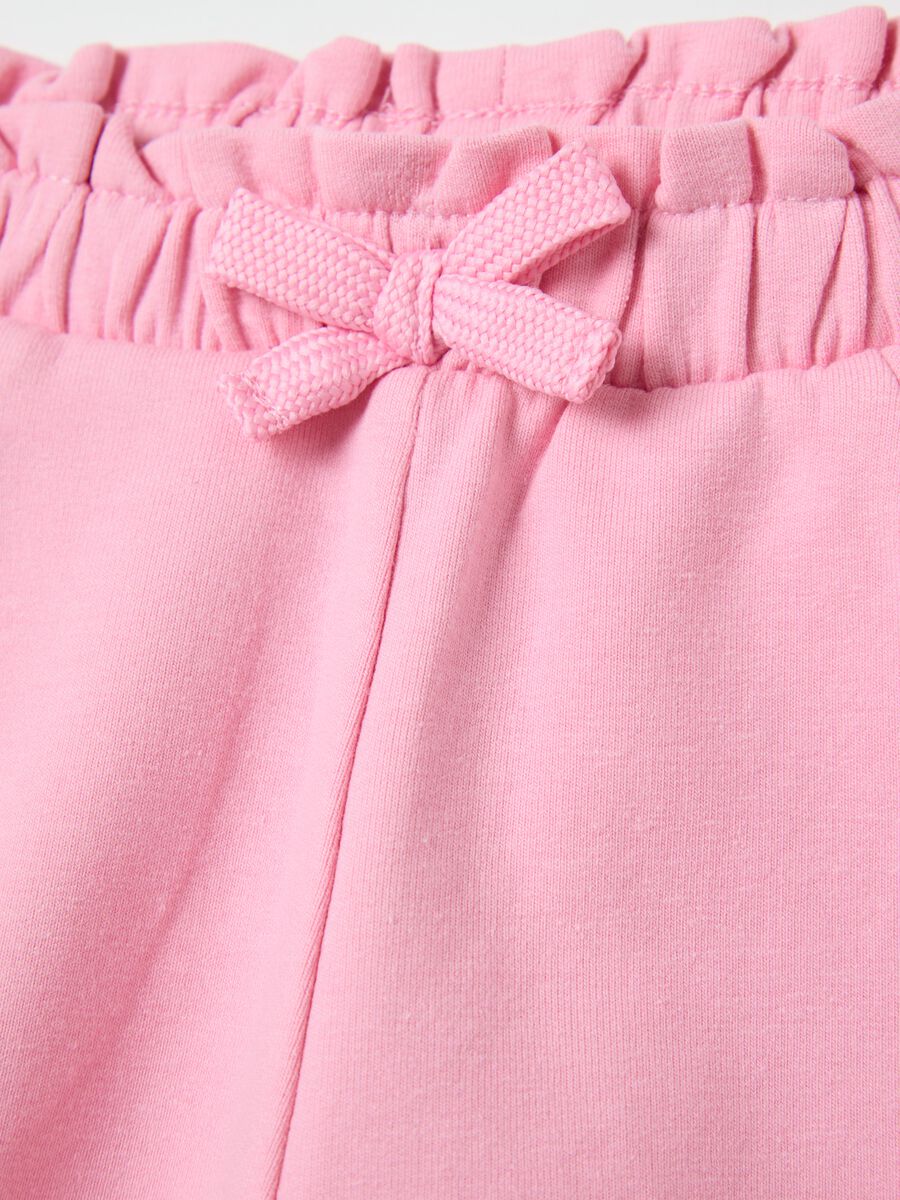Shorts rosa in French Terry con fiocco e rouches _2