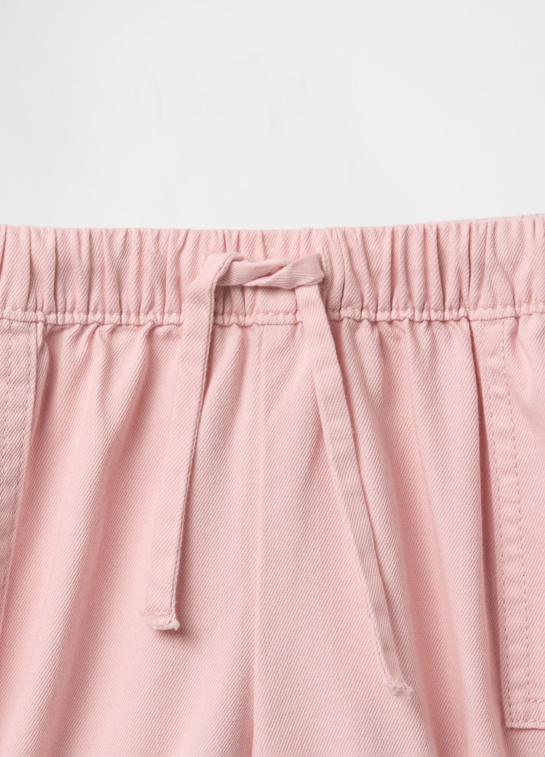 Pink children's shorts with drawstring