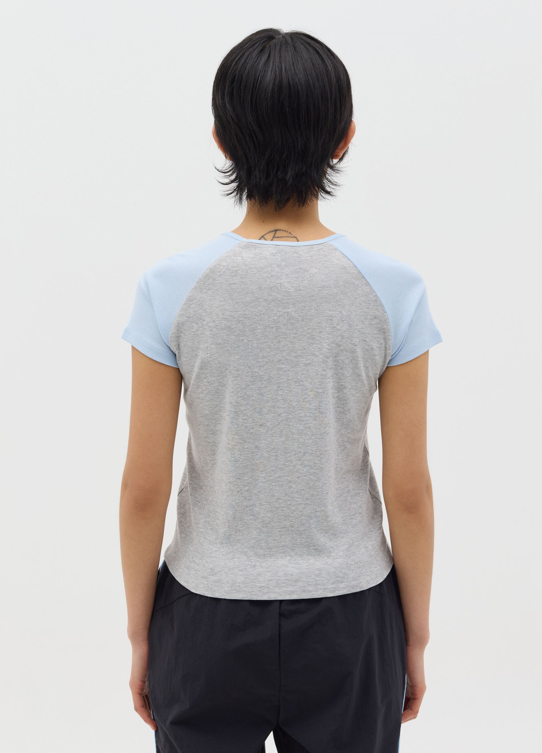 Grey T-shirt with light blue raglan sleeves