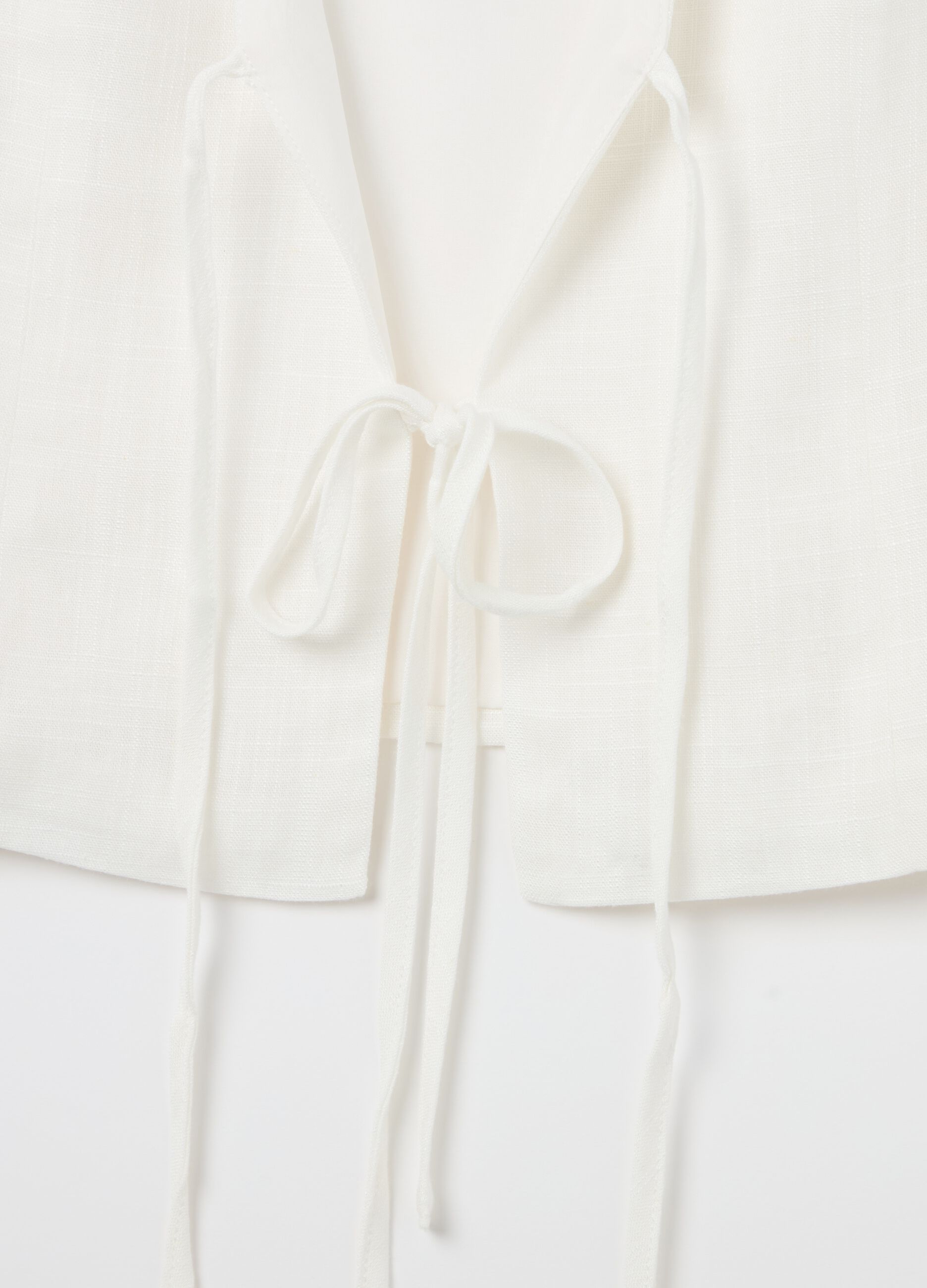 White linen gilet with laces