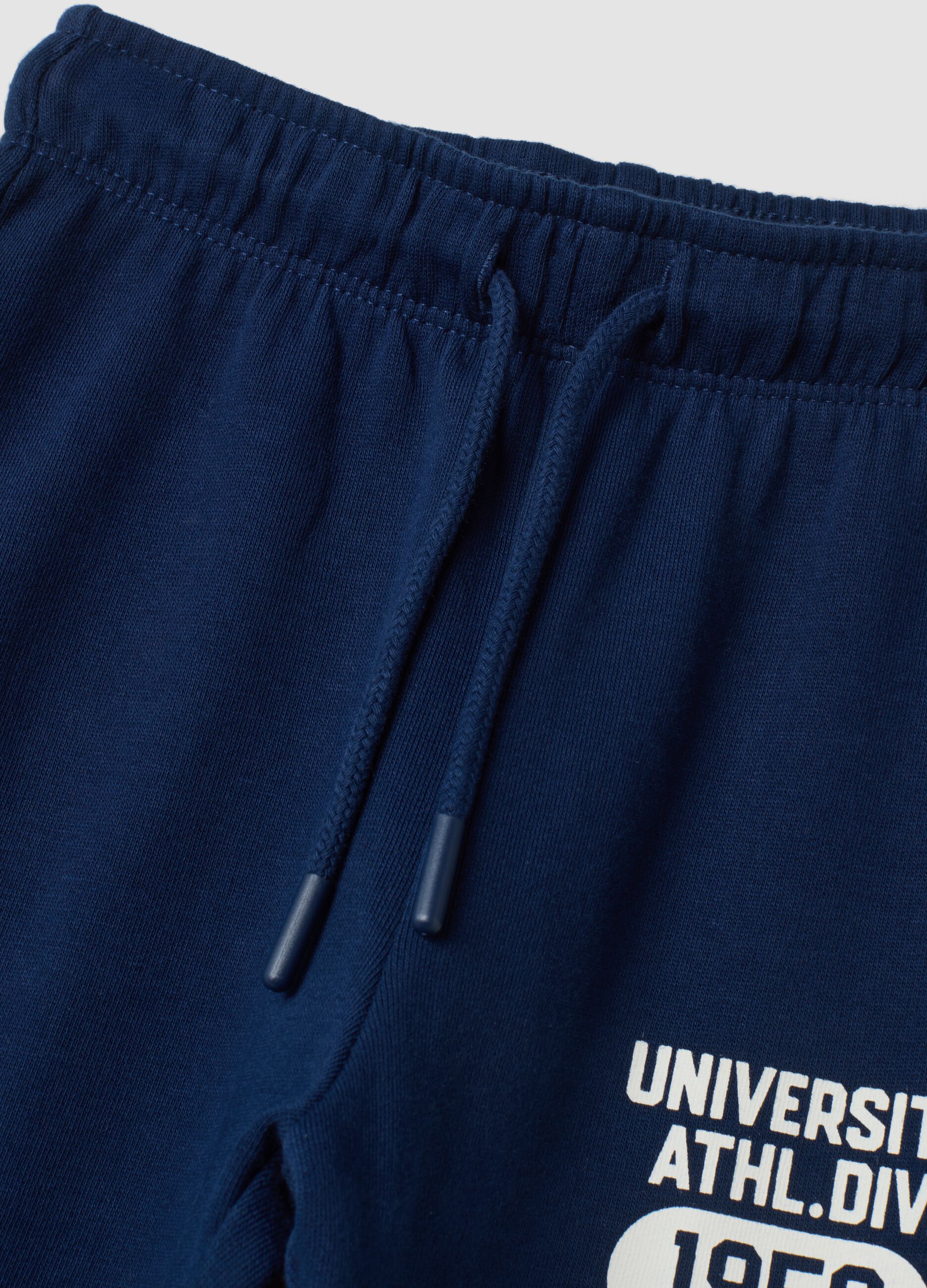 Pantaloni jogger blu in puro cotone con stampa