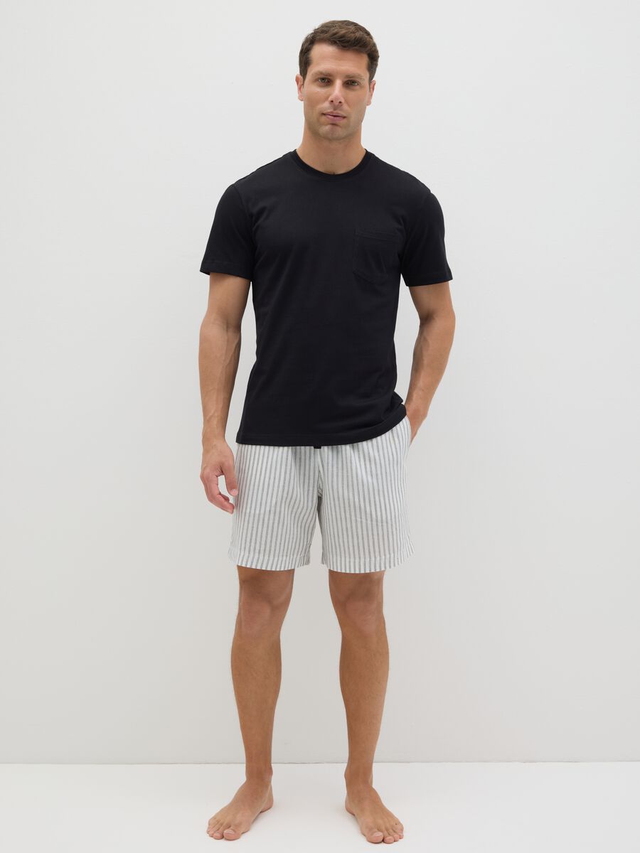Men's pyjamas in pure black cotton, regular fit with checked shorts_0