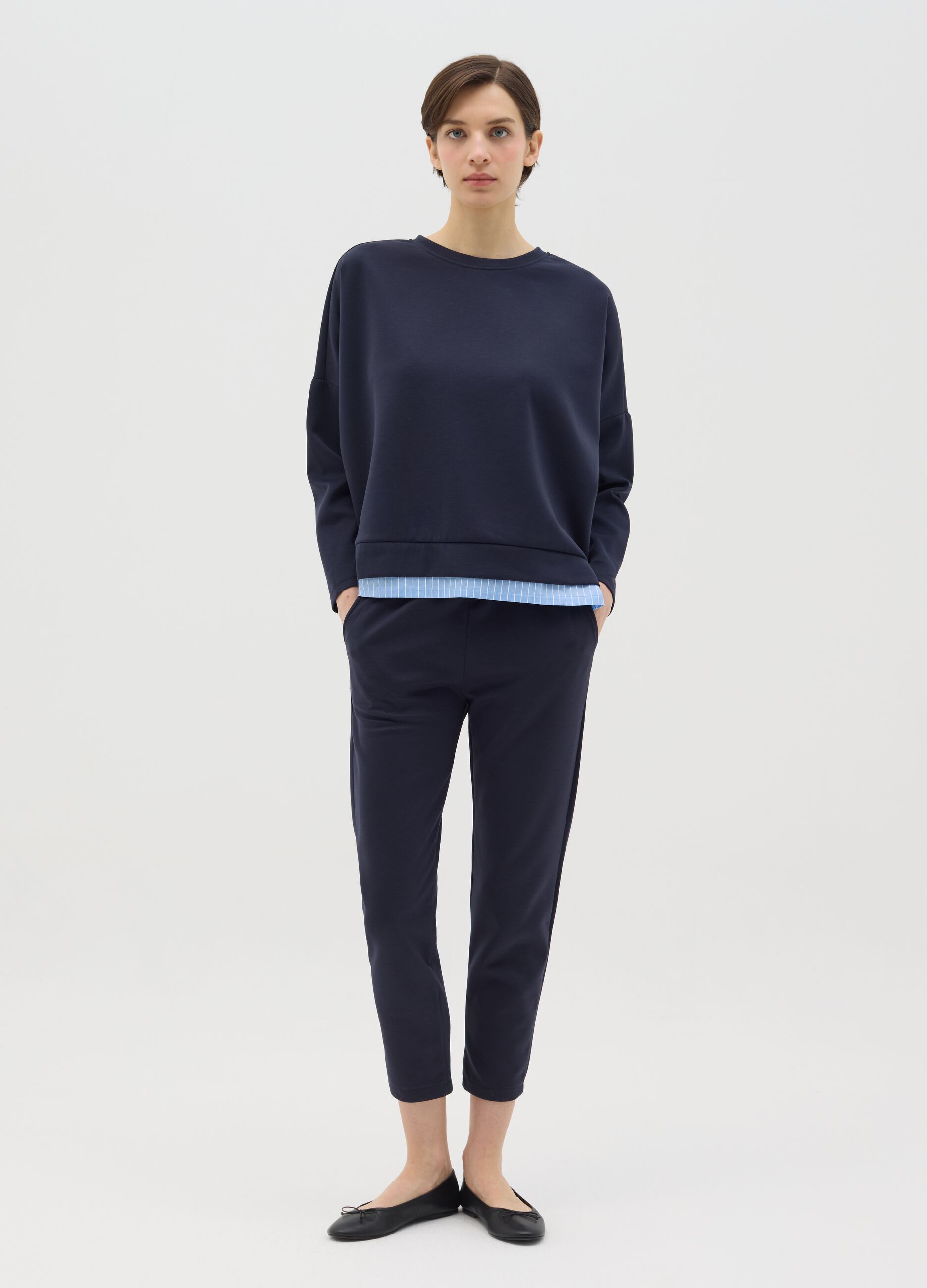 Blue top with layered-effect hem