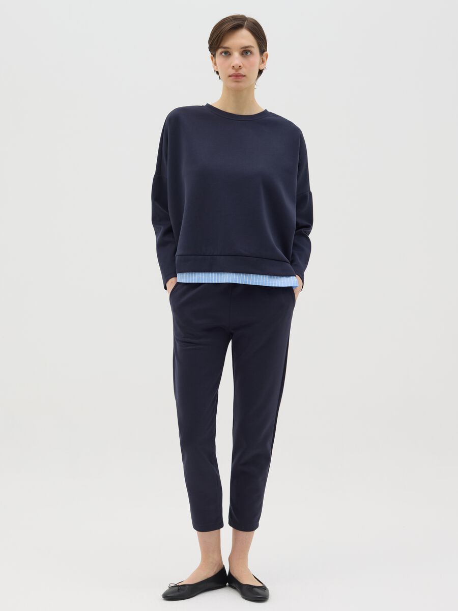 Blue top with layered-effect hem_1