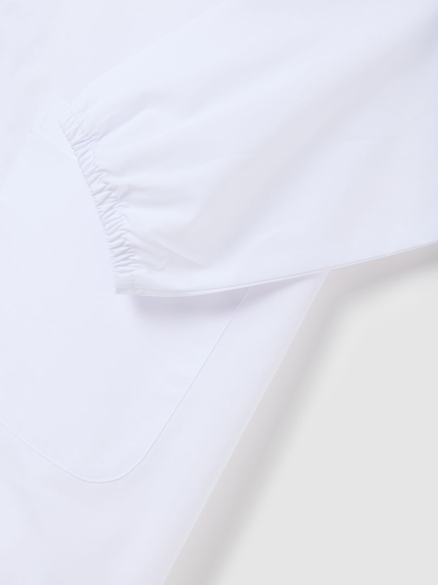 Girls' school smock in white cotton blend with Stitch embroidery_3