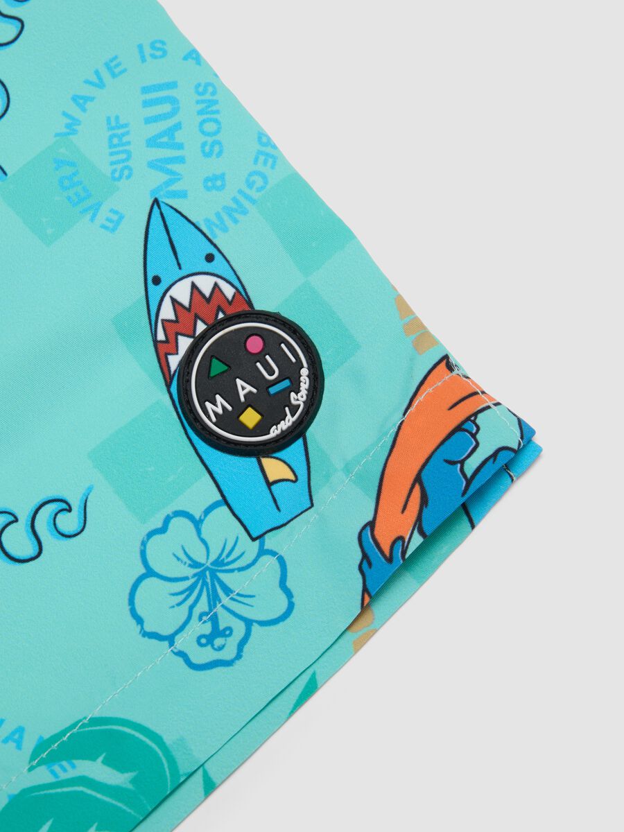 Blue boys&rsquo; swim shorts with tropical print_2