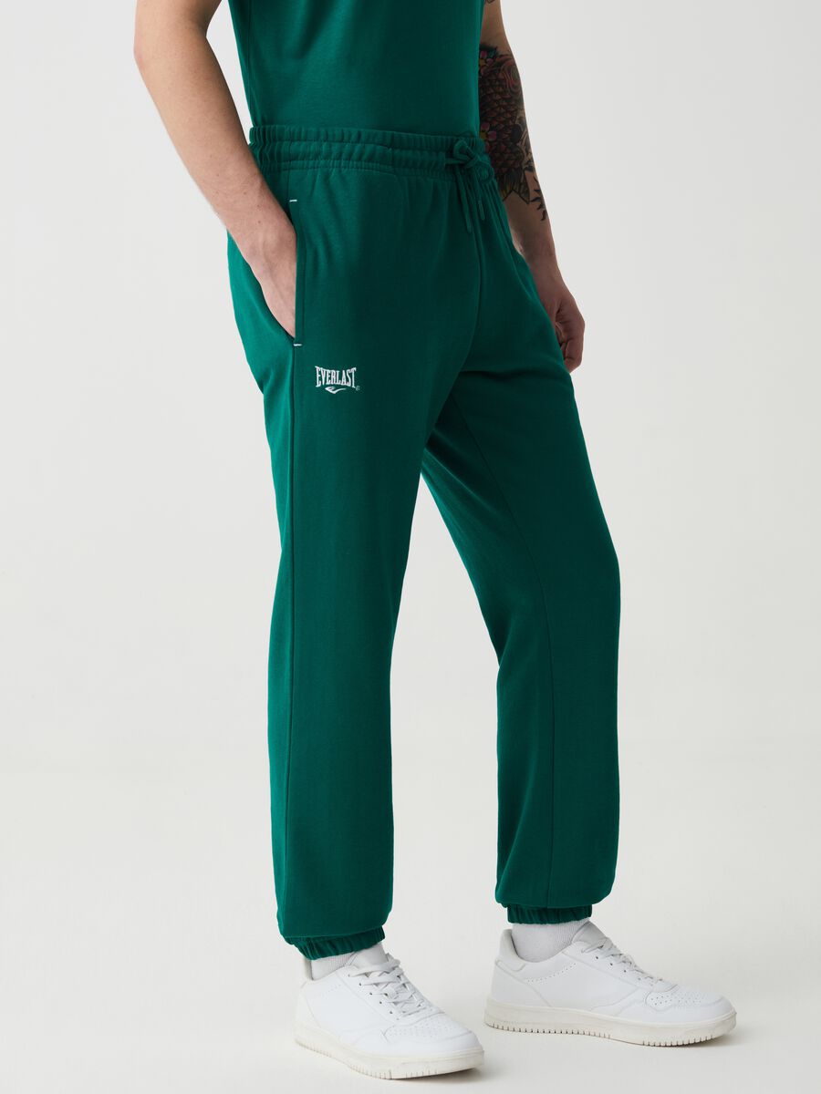 Fleece joggers with drawstring and embroidered logo_1
