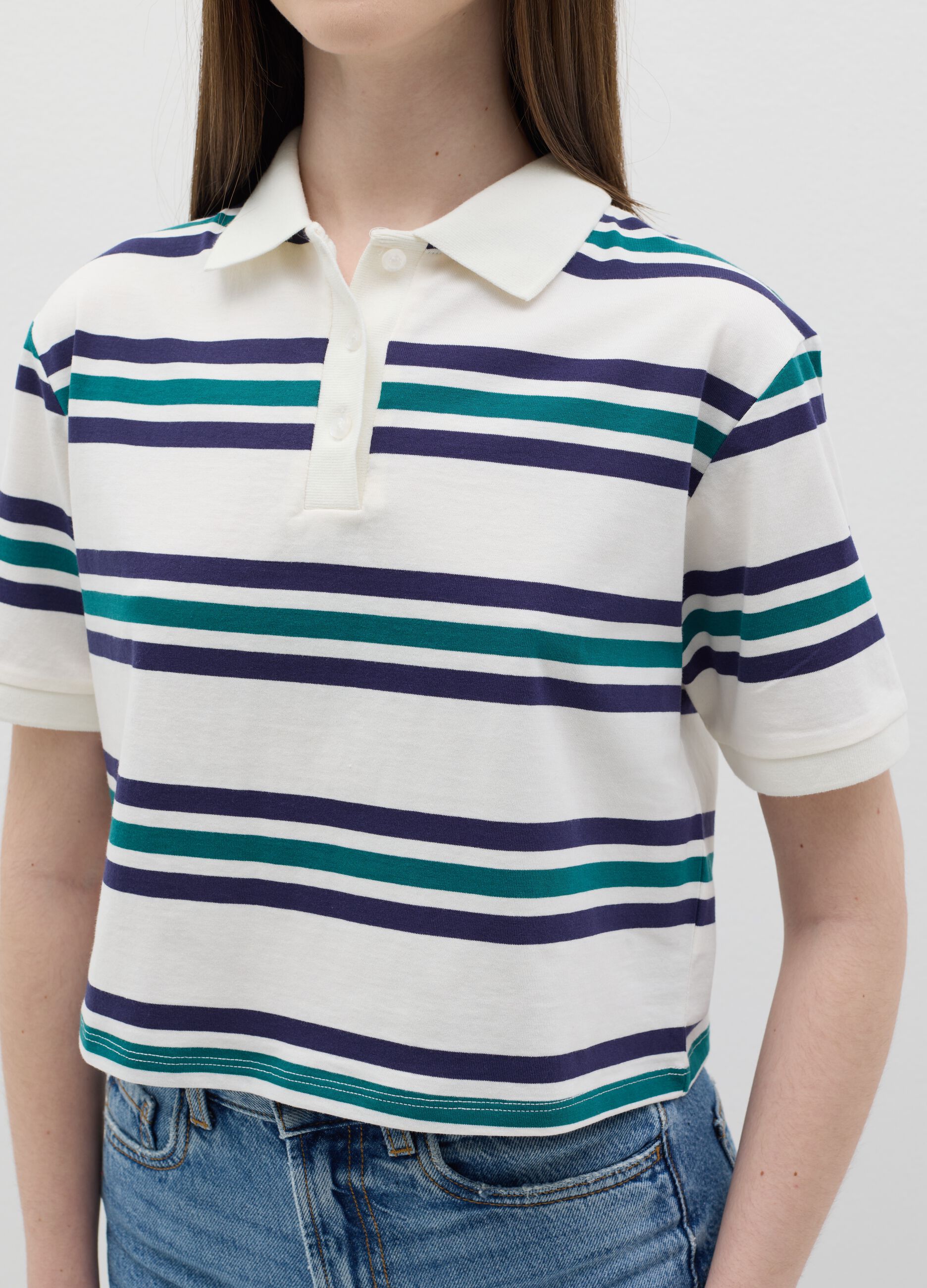 Green and white striped polo shirt