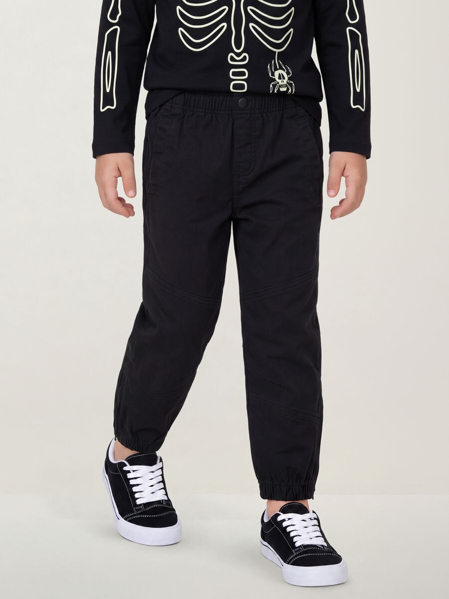 Black stretch cotton jogger trousers for boys_1