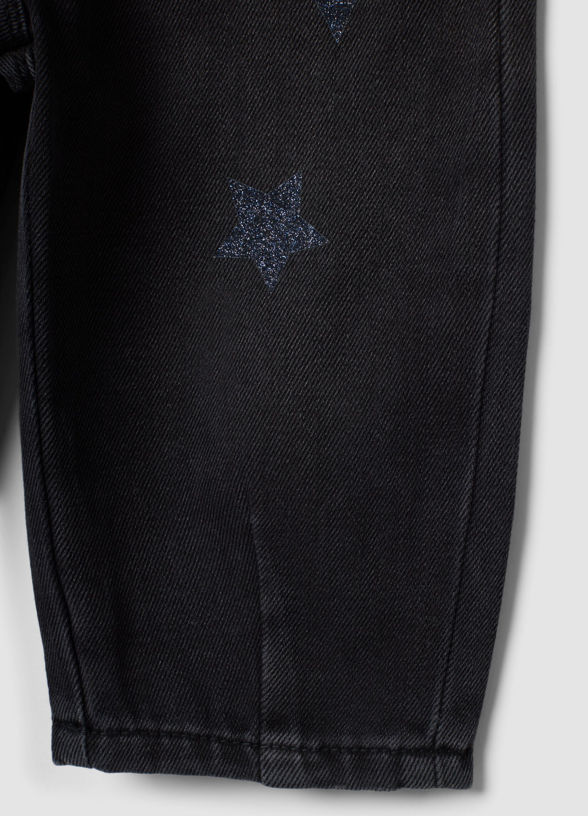 Black balloon-fit jeans in cotton and viscose blend with star print for baby girl