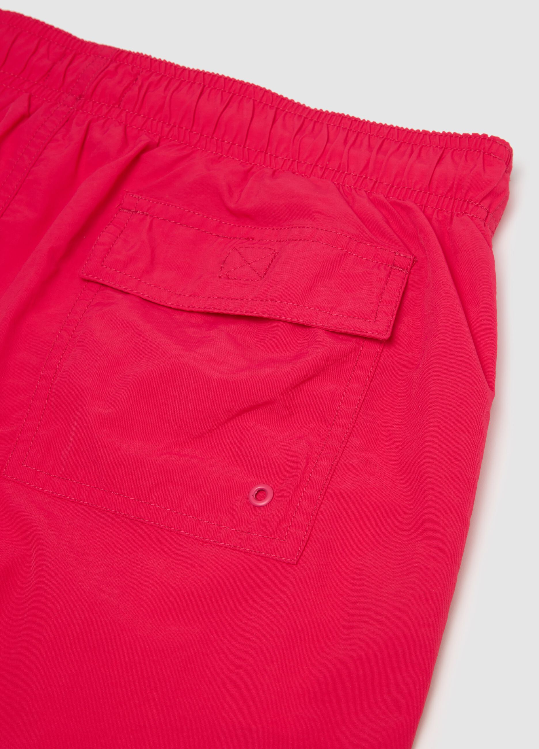 Men’s regular-fit swim boxers in pink blend with elastic waist