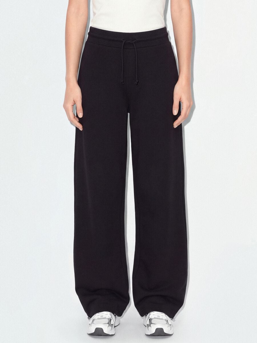 Black cotton-blend baggy-fit jogger trousers_1