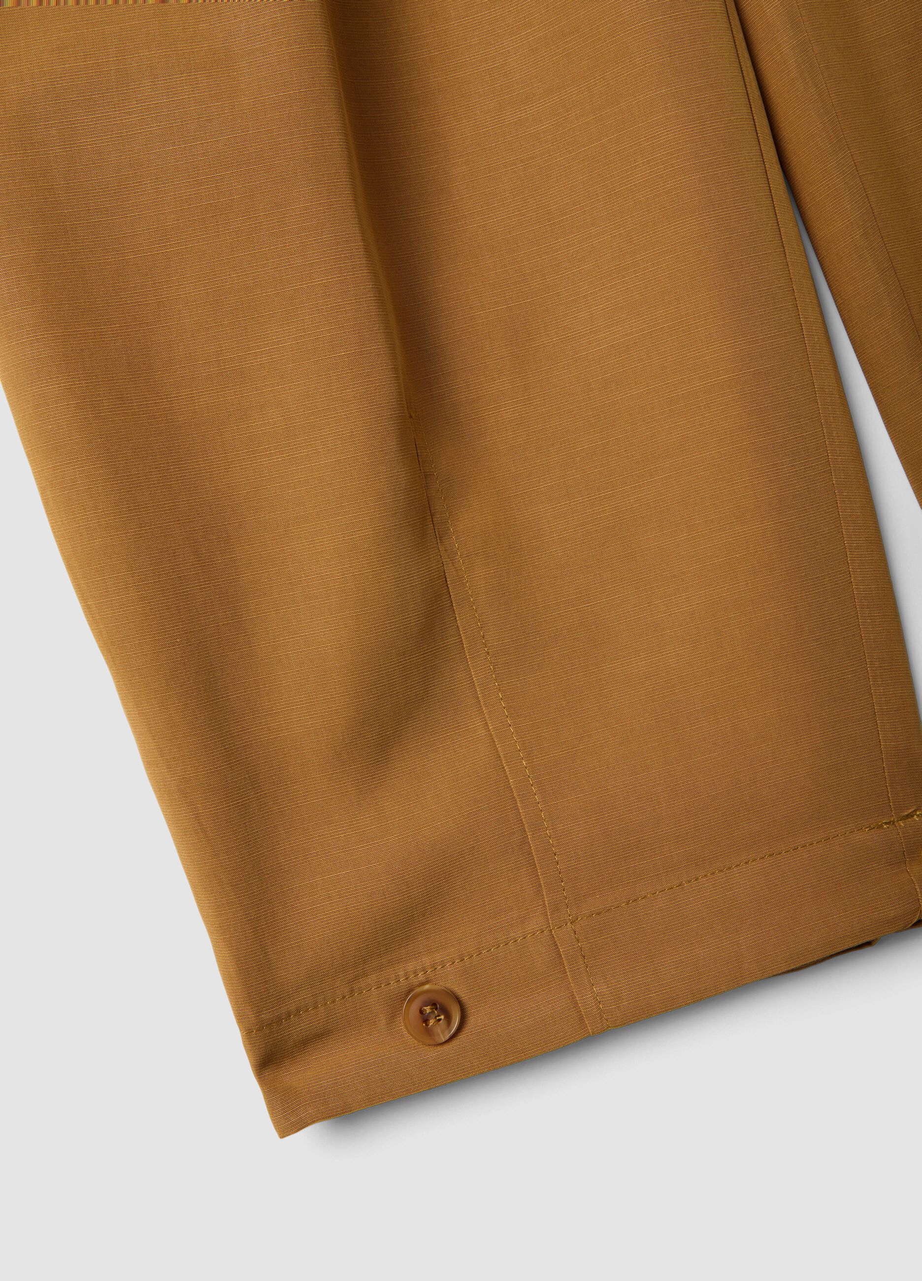 Brown lyocell-cotton blend slouchy fit trousers