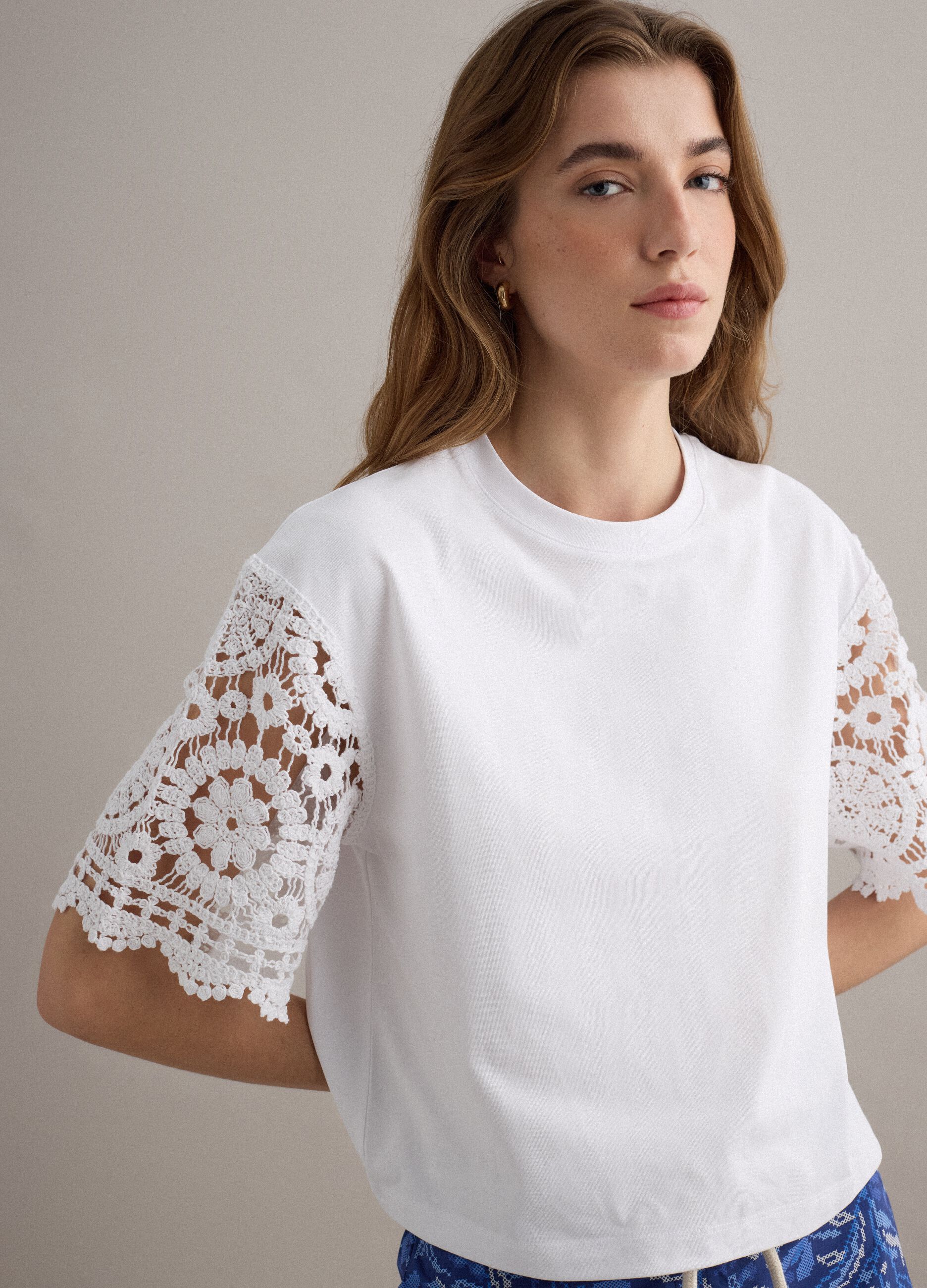 White short-sleeve cotton-blend T-shirt with mesh details