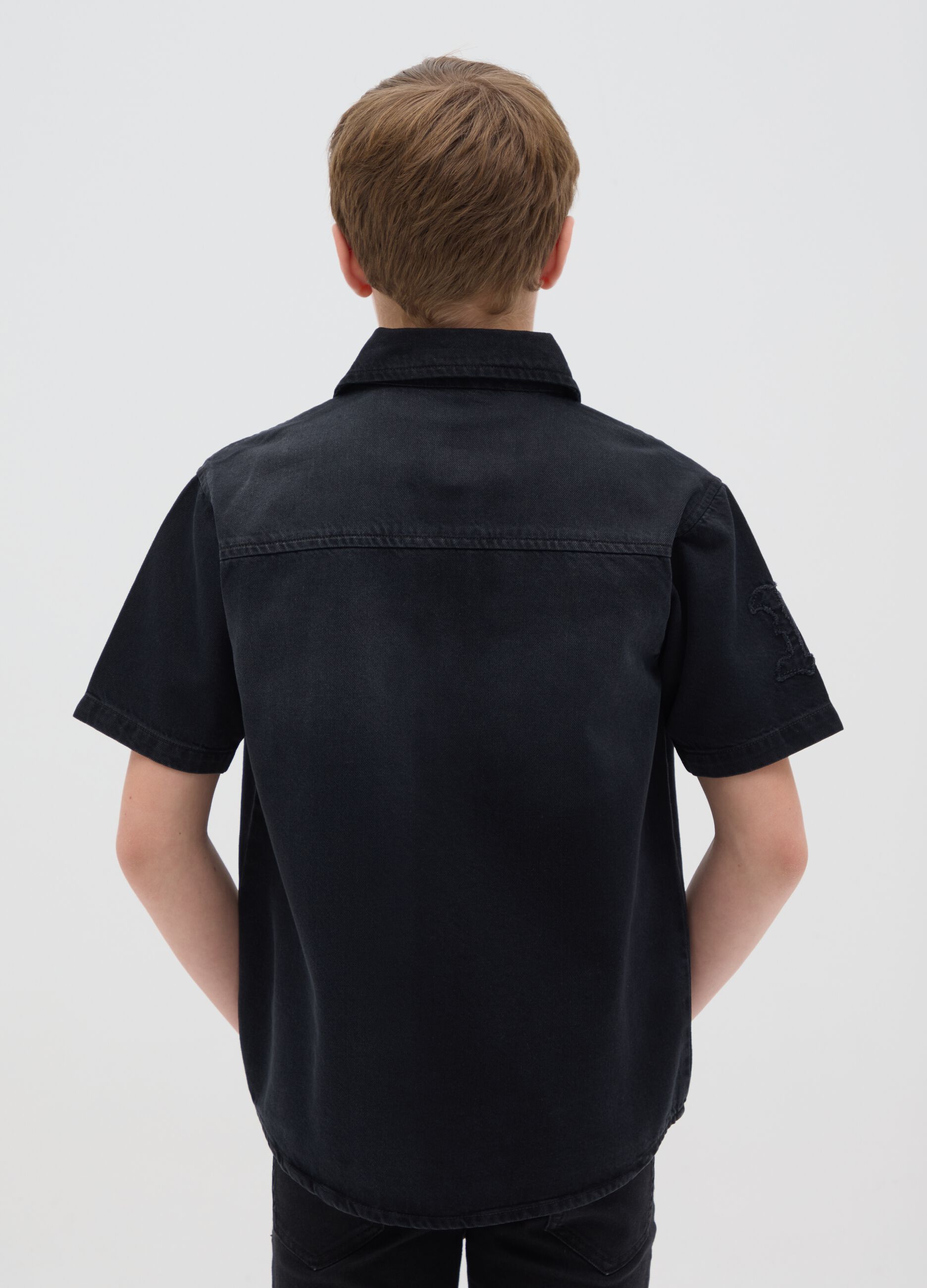 Black shirt in denim with embroidery