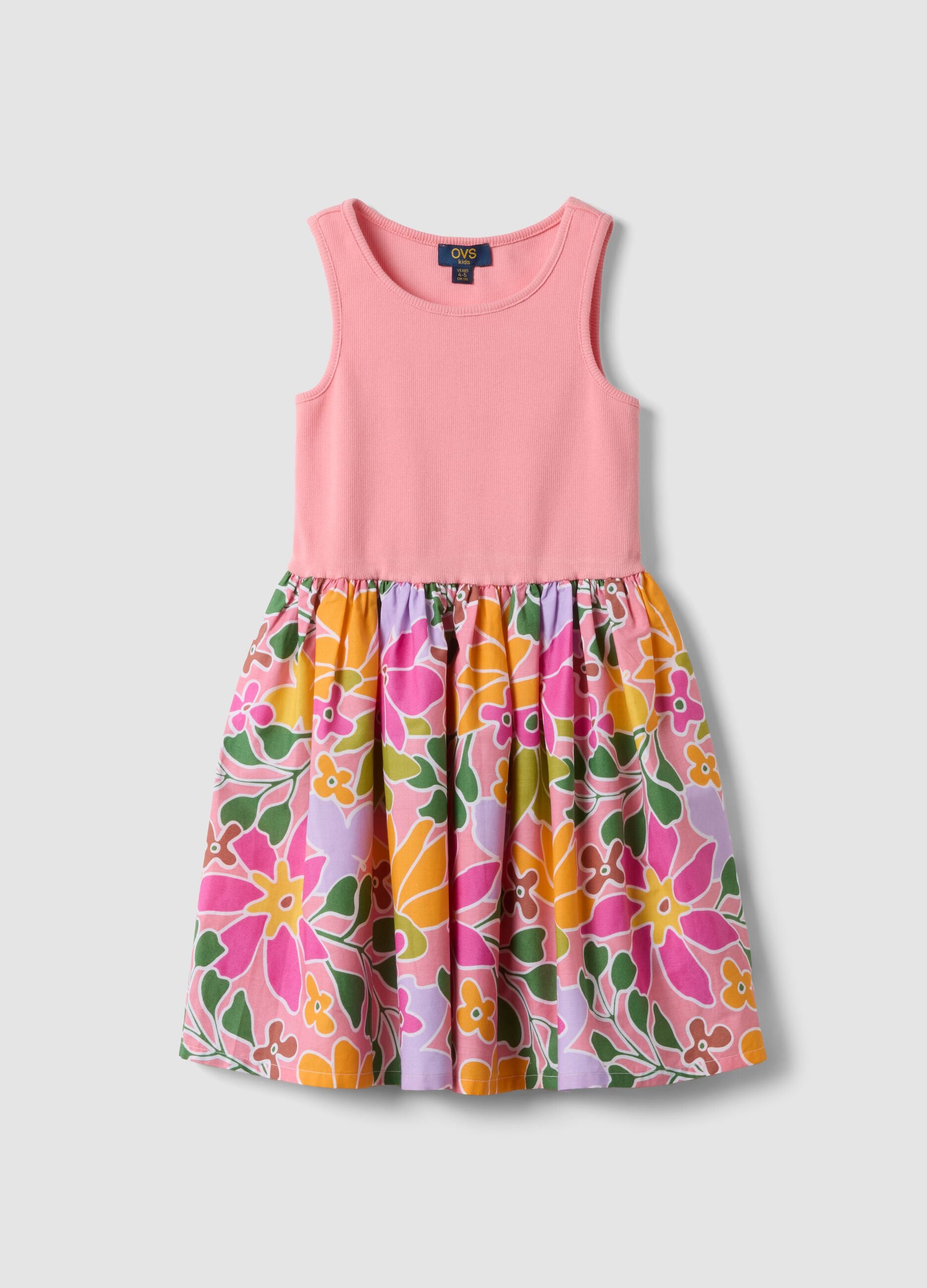 Abito rosa in cotone elasticizzato con gonna fantasia floreale per bambina