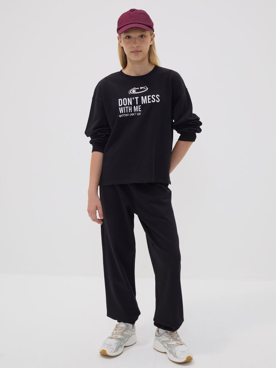 Pantaloni jogger neri in misto cotone organico con stampa per ragazza_0