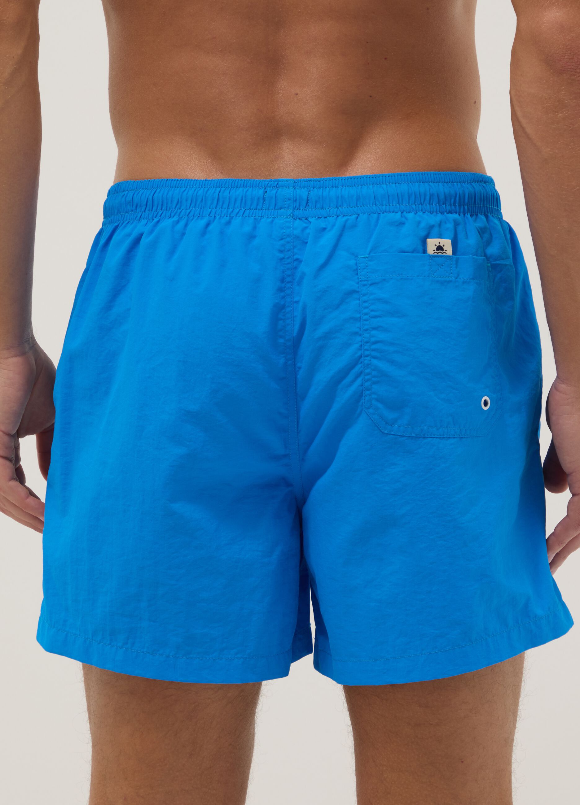 Boxer da mare blu con elastico in vita